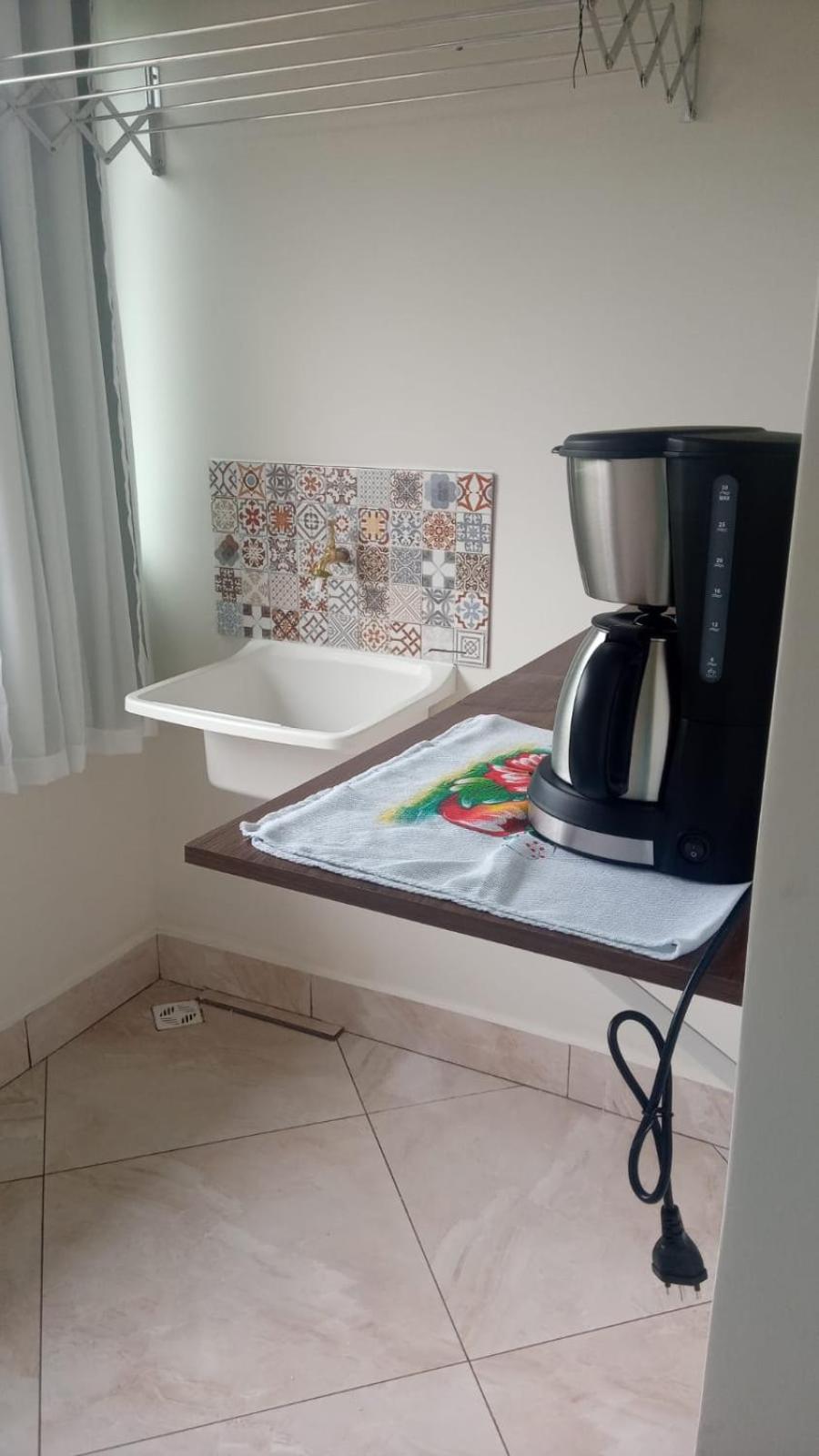 Casa de 4 suites com piscina, próxima a praias e do centro de Ubatuba