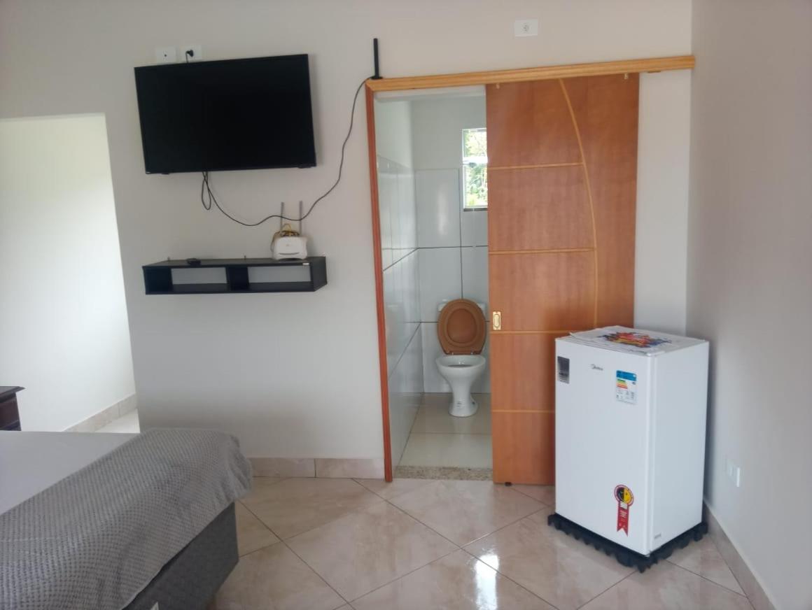 Casa de 4 suites com piscina, próxima a praias e do centro de Ubatuba