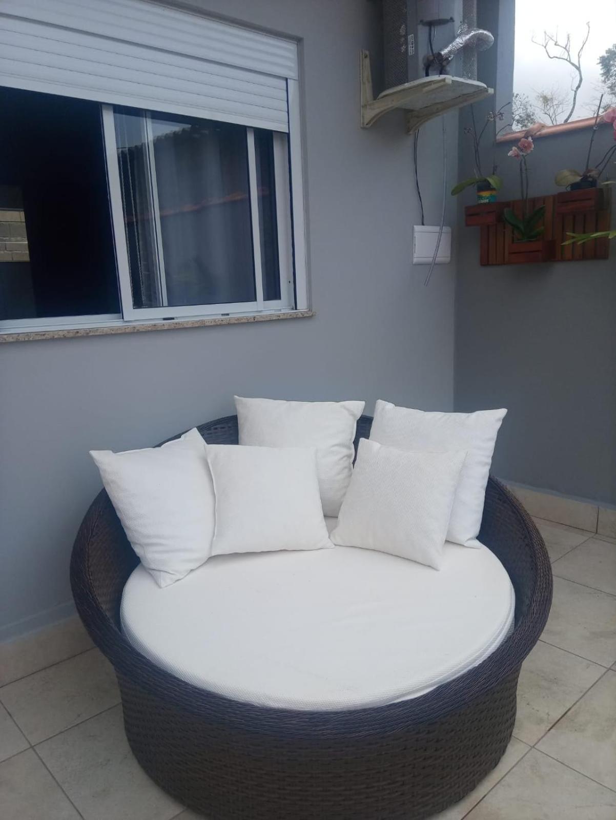 Casa de 4 suites com piscina, próxima a praias e do centro de Ubatuba
