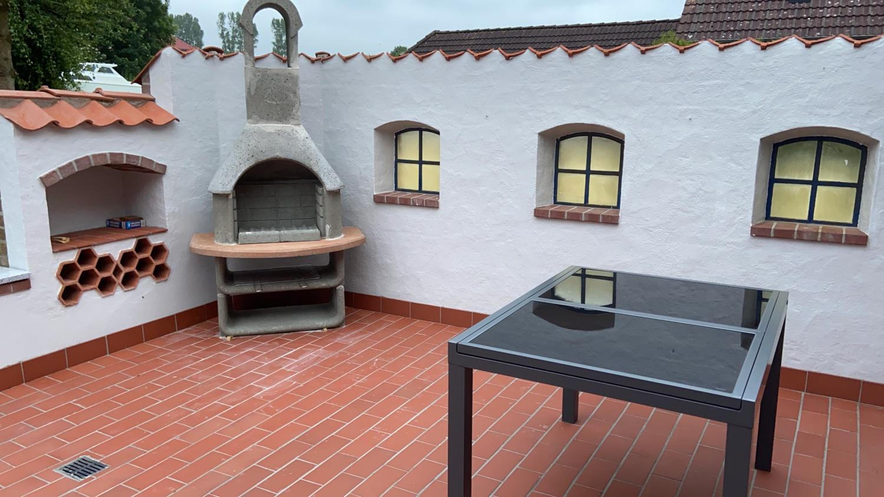 Lindenhuus-Urlaub unter einem Teilreetdach-Terrasse - Nahe Norden-Norddeich