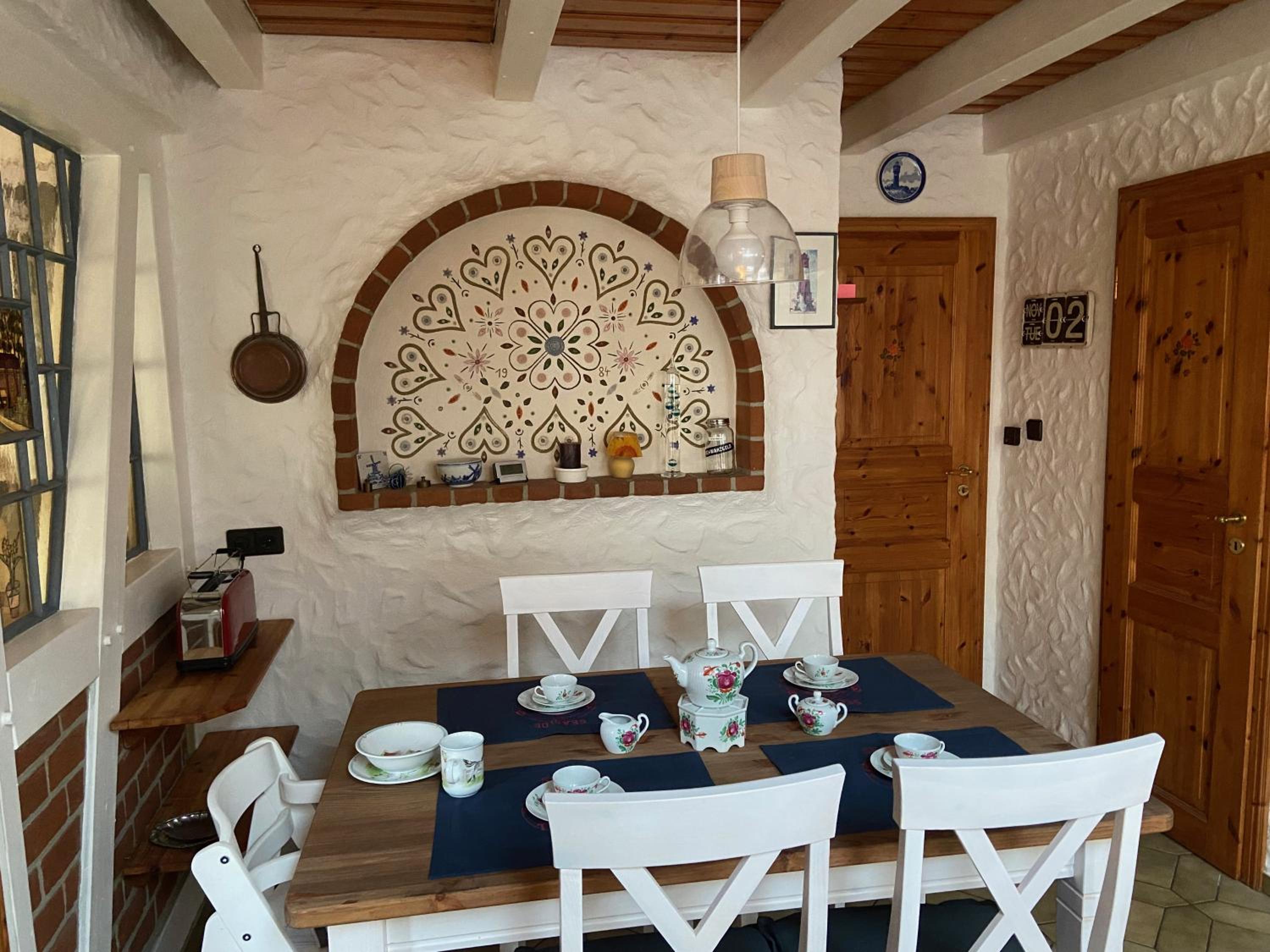 Lindenhuus-Urlaub unter einem Teilreetdach-Terrasse - Nahe Norden-Norddeich