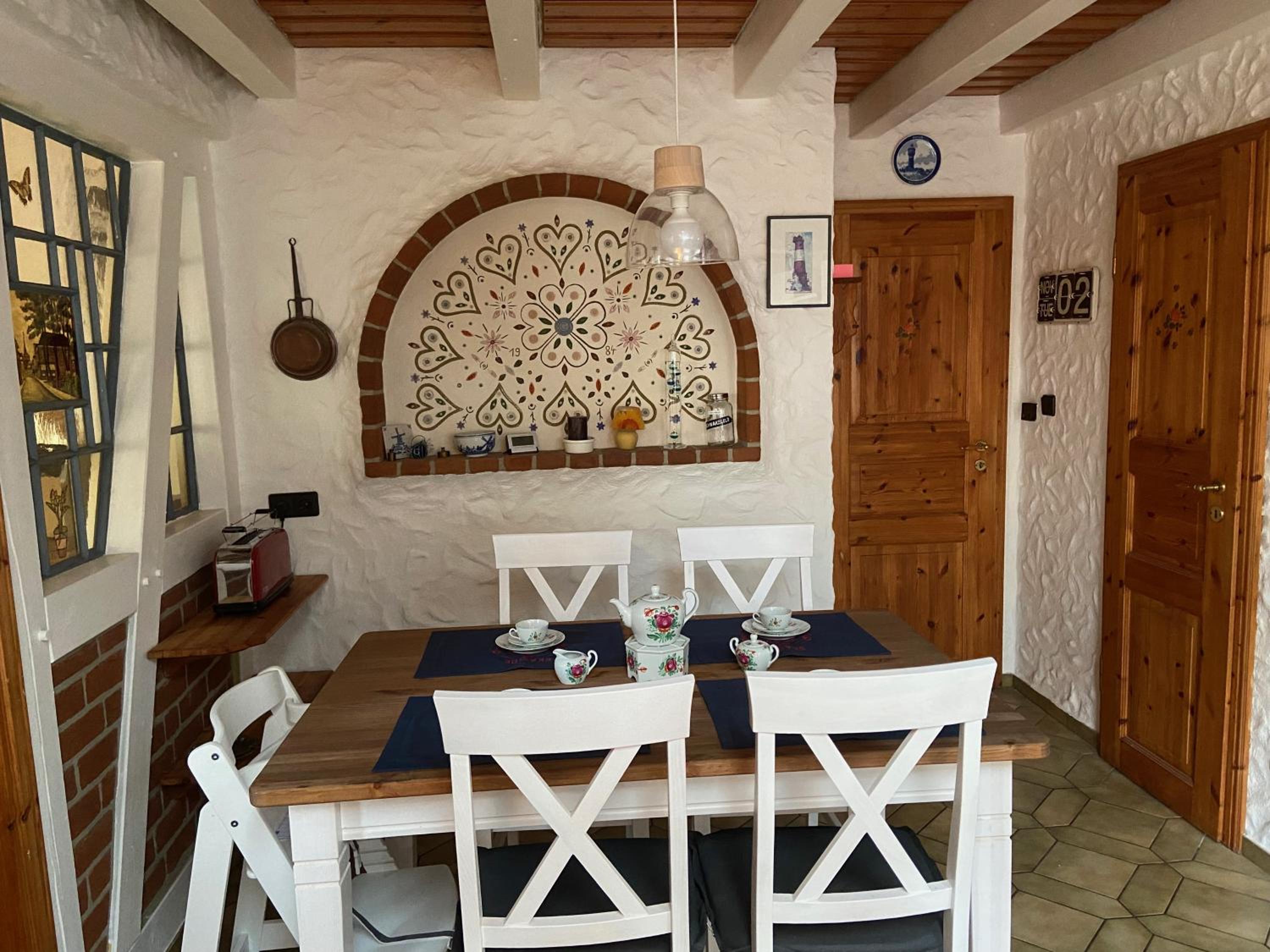 Lindenhuus-Urlaub unter einem Teilreetdach-Terrasse - Nahe Norden-Norddeich