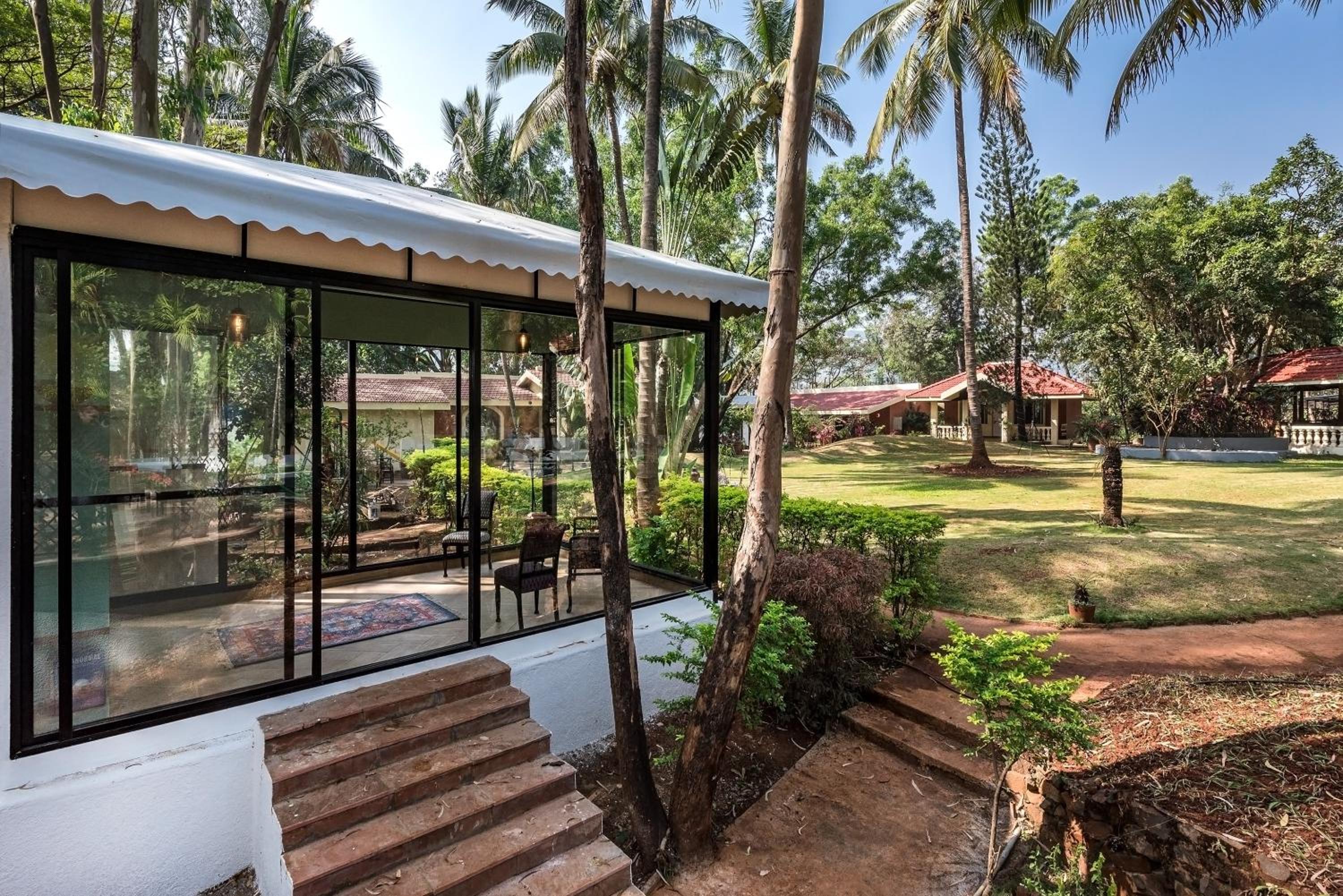 SaffronStays Foresta by the Lake - 6BR veg-only pool estate with lake views, lawns, gazebo & sports court in Kamshet view 2