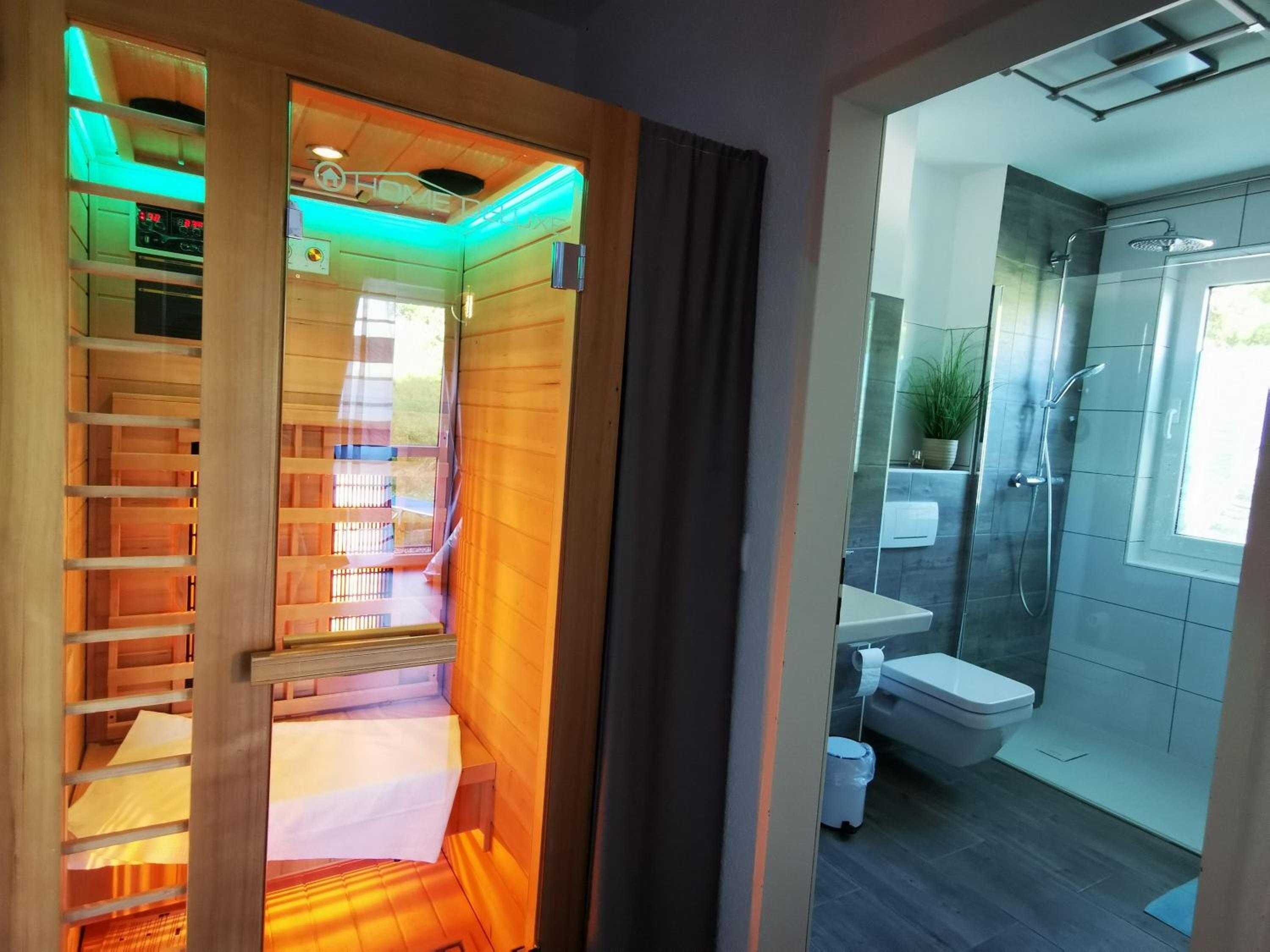 strandnah, Wintergarten, gratis Nutzung vom AHOI Erlebnisbad und Sauna in Sellin - Strandhaus Mönchgut FeWo08