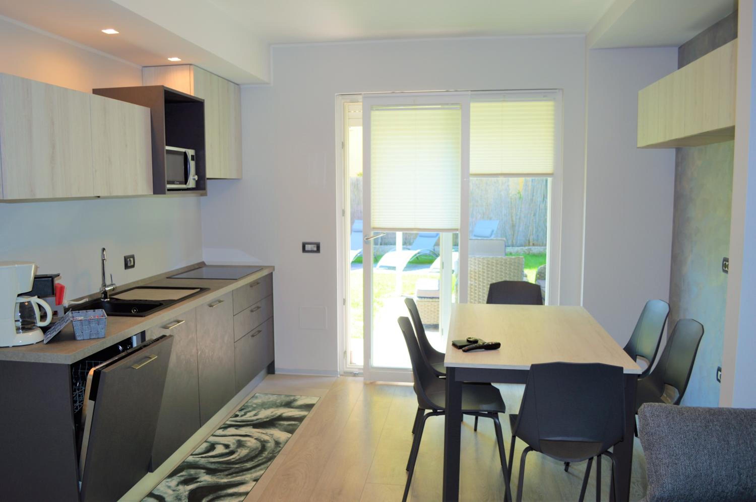 Appartamento Campagnola con giardino privato e due camere da letto view 4