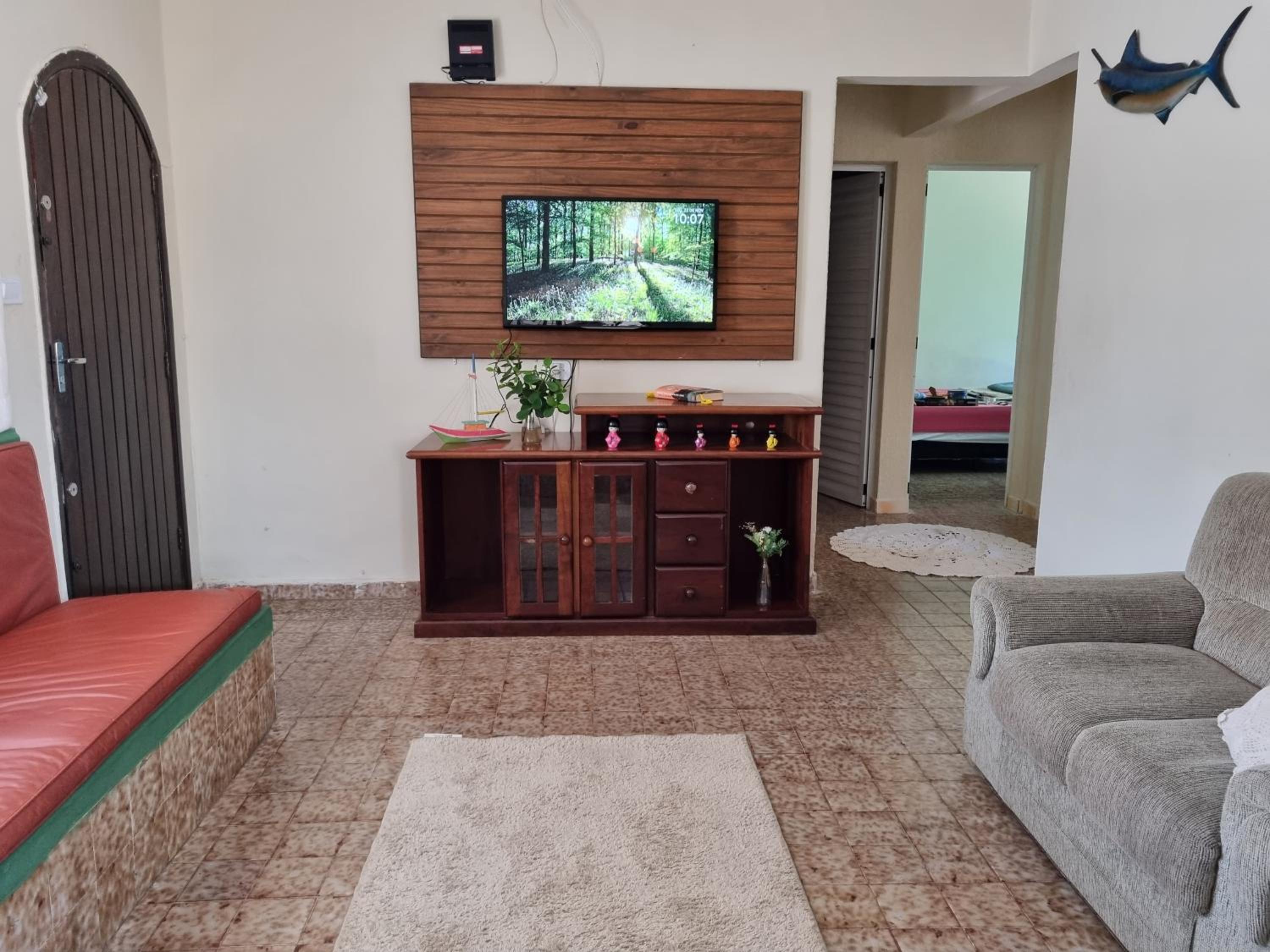 Confortável casa com piscina e churrasqueira a 100m da praia