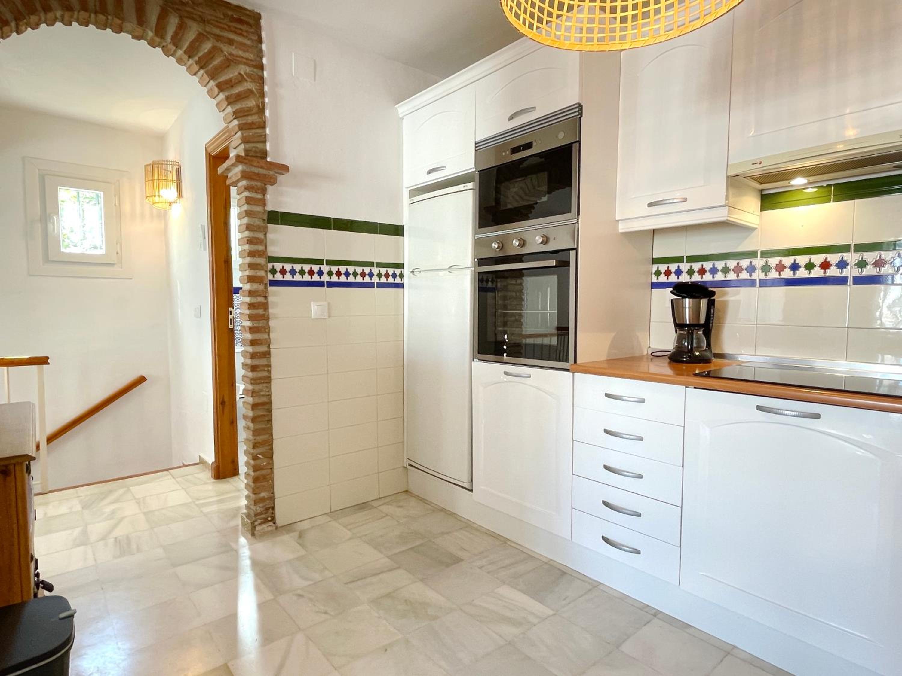 Semidetached Duplex home at Puebla Aida, Mijas Golf with pool, golf and sea views