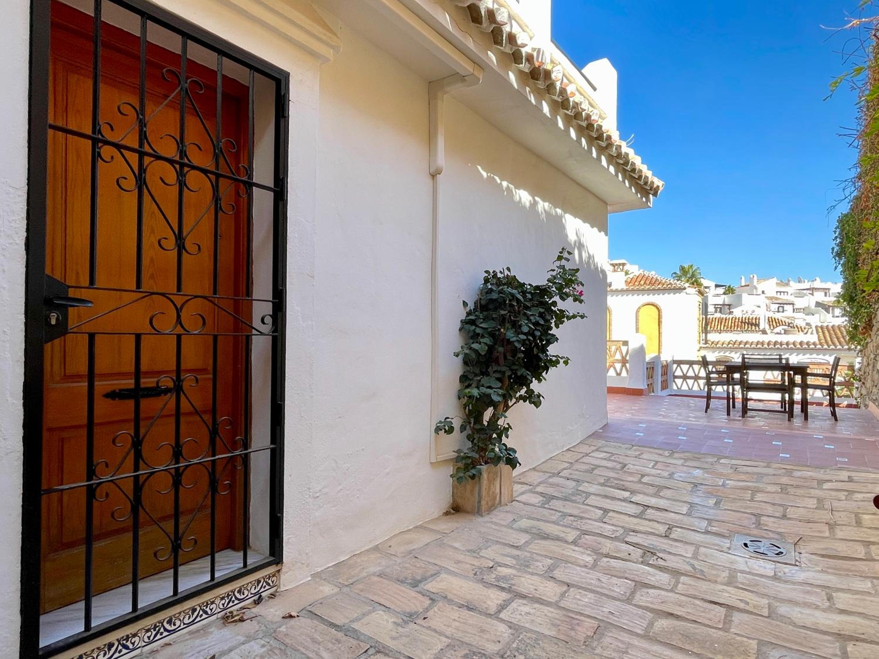 Semidetached Duplex home at Puebla Aida, Mijas Golf with pool, golf and sea views