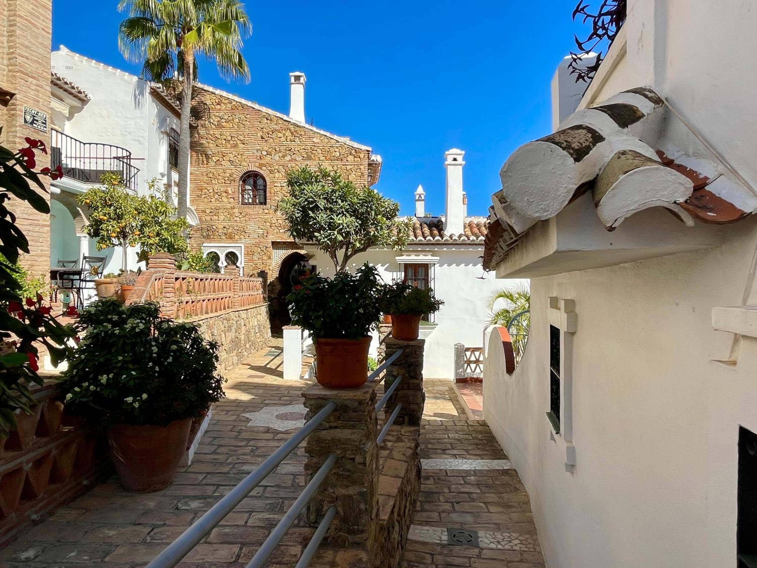 Semidetached Duplex home at Puebla Aida, Mijas Golf with pool, golf and sea views