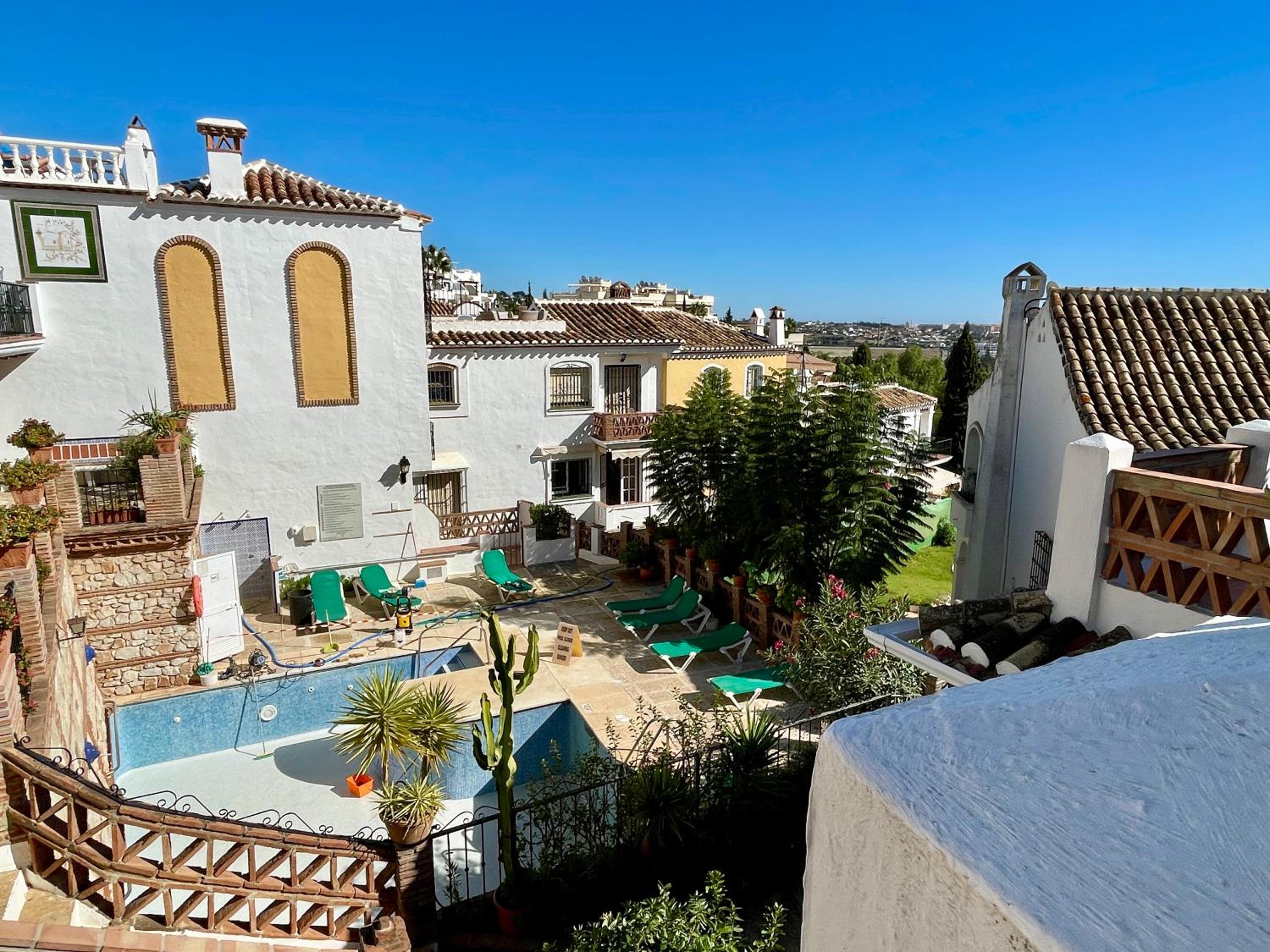 Semidetached Duplex home at Puebla Aida, Mijas Golf with pool, golf and sea views