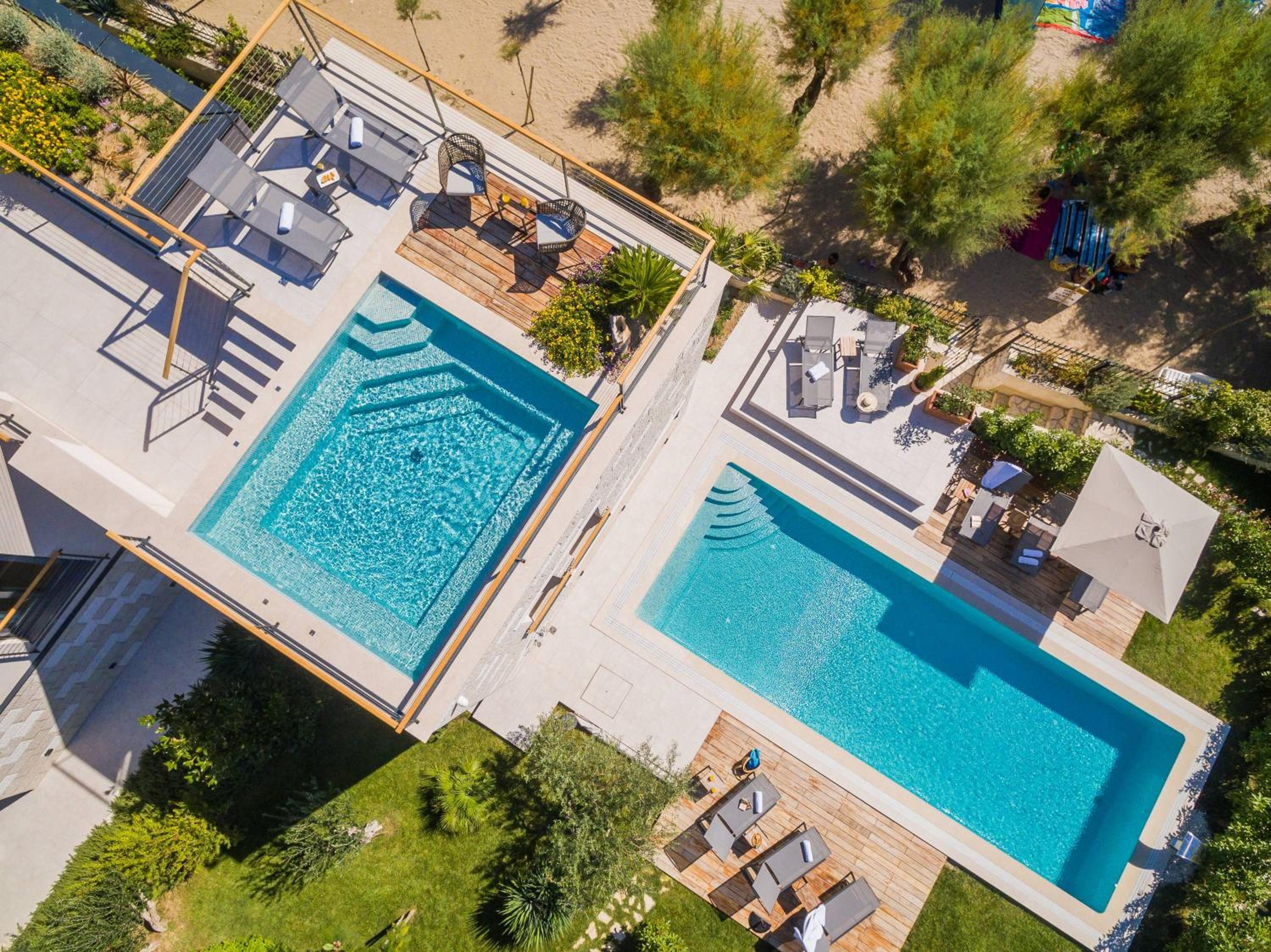 Luxury beachfront VILLA FLORES heated outdoor, indoor pool, whirlpool, sauna view 3