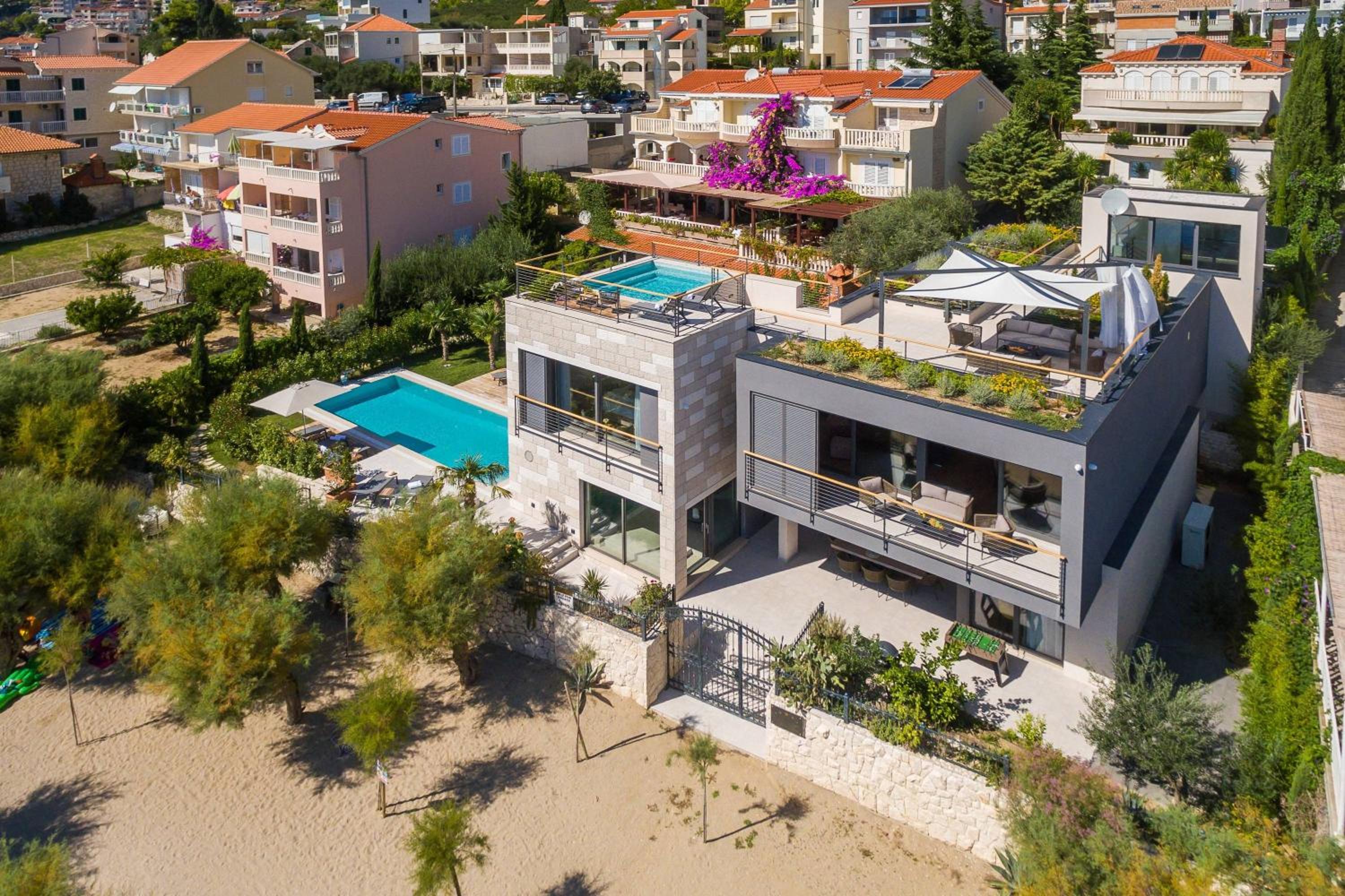 Luxury beachfront VILLA FLORES heated outdoor, indoor pool, whirlpool, sauna view 4