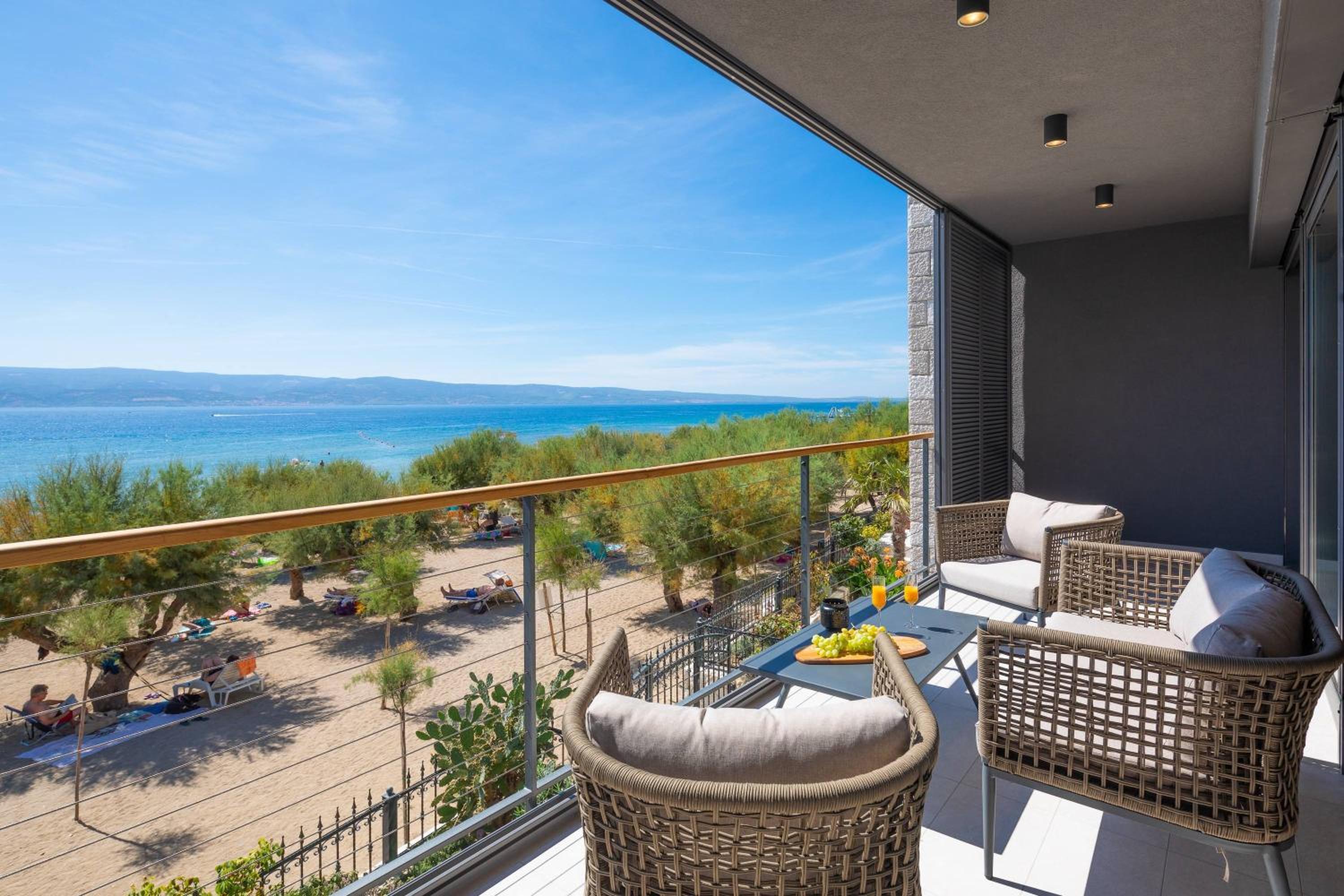 Luxury beachfront VILLA FLORES heated outdoor, indoor pool, whirlpool, sauna view 5
