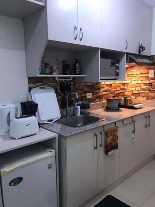 Cozy Condo with Amenities at Cool Suites view 4