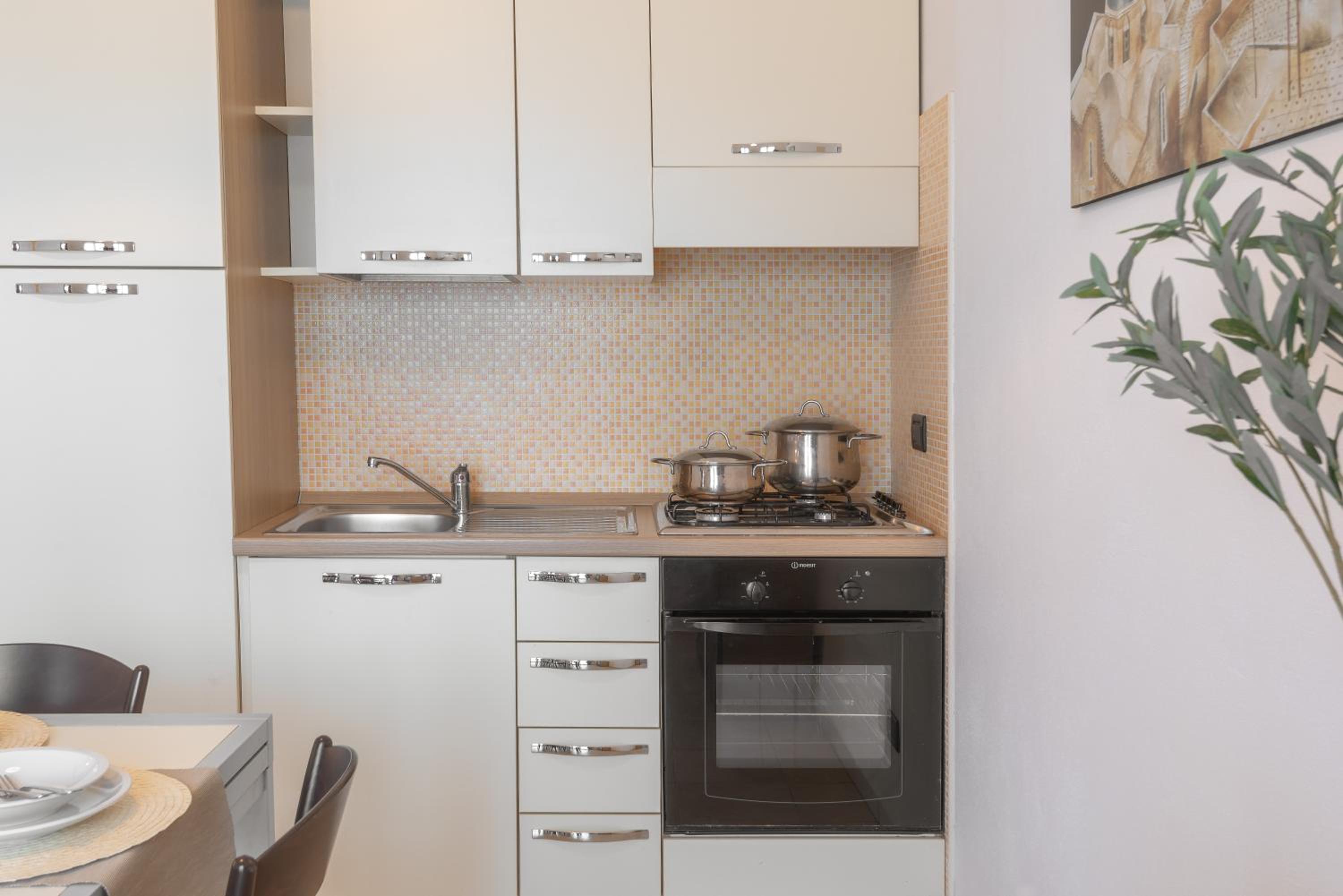 Residence Le Fontane en Villasimius — kitchen