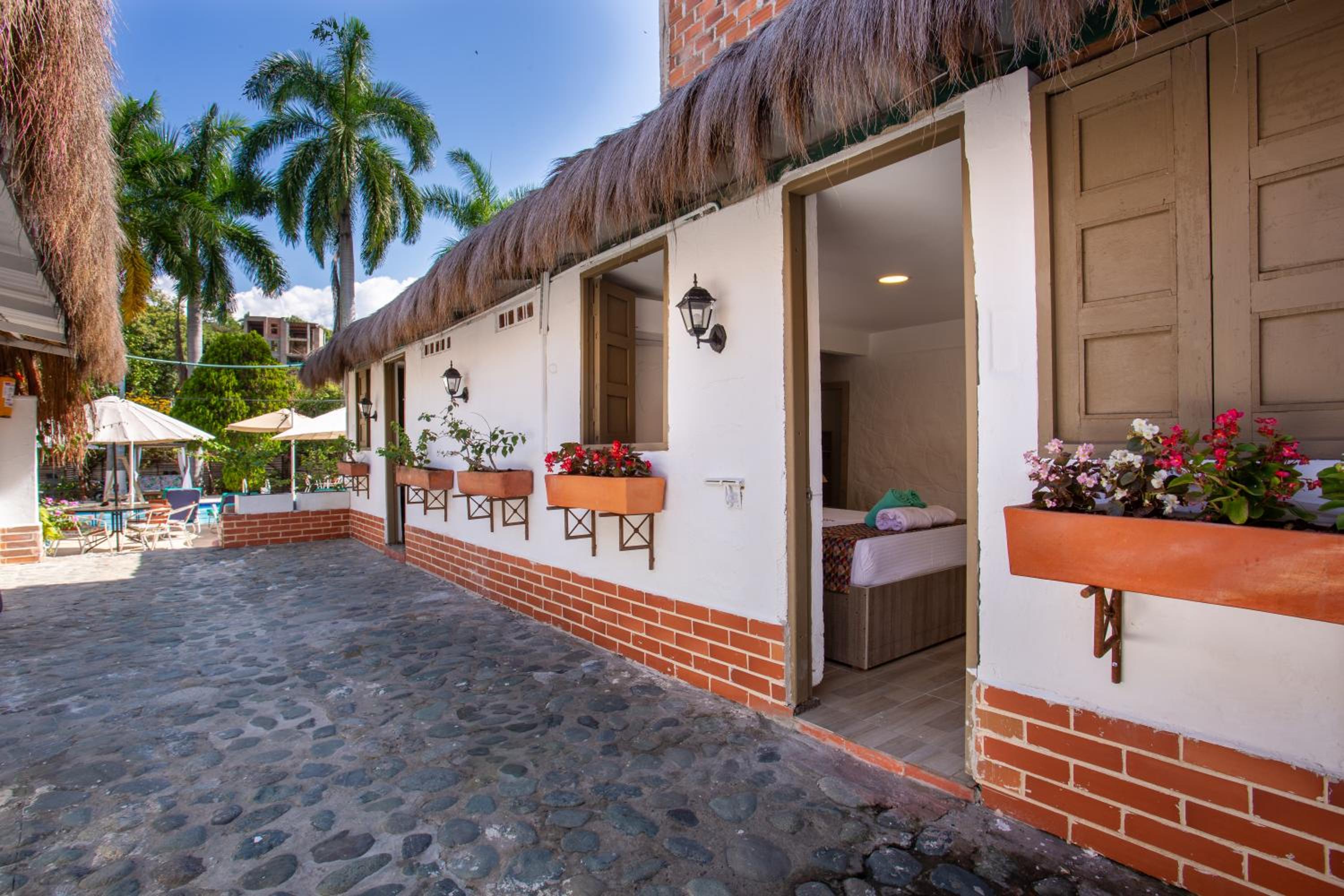 Hotel Entre Palmas Casa Hotel - Image 1