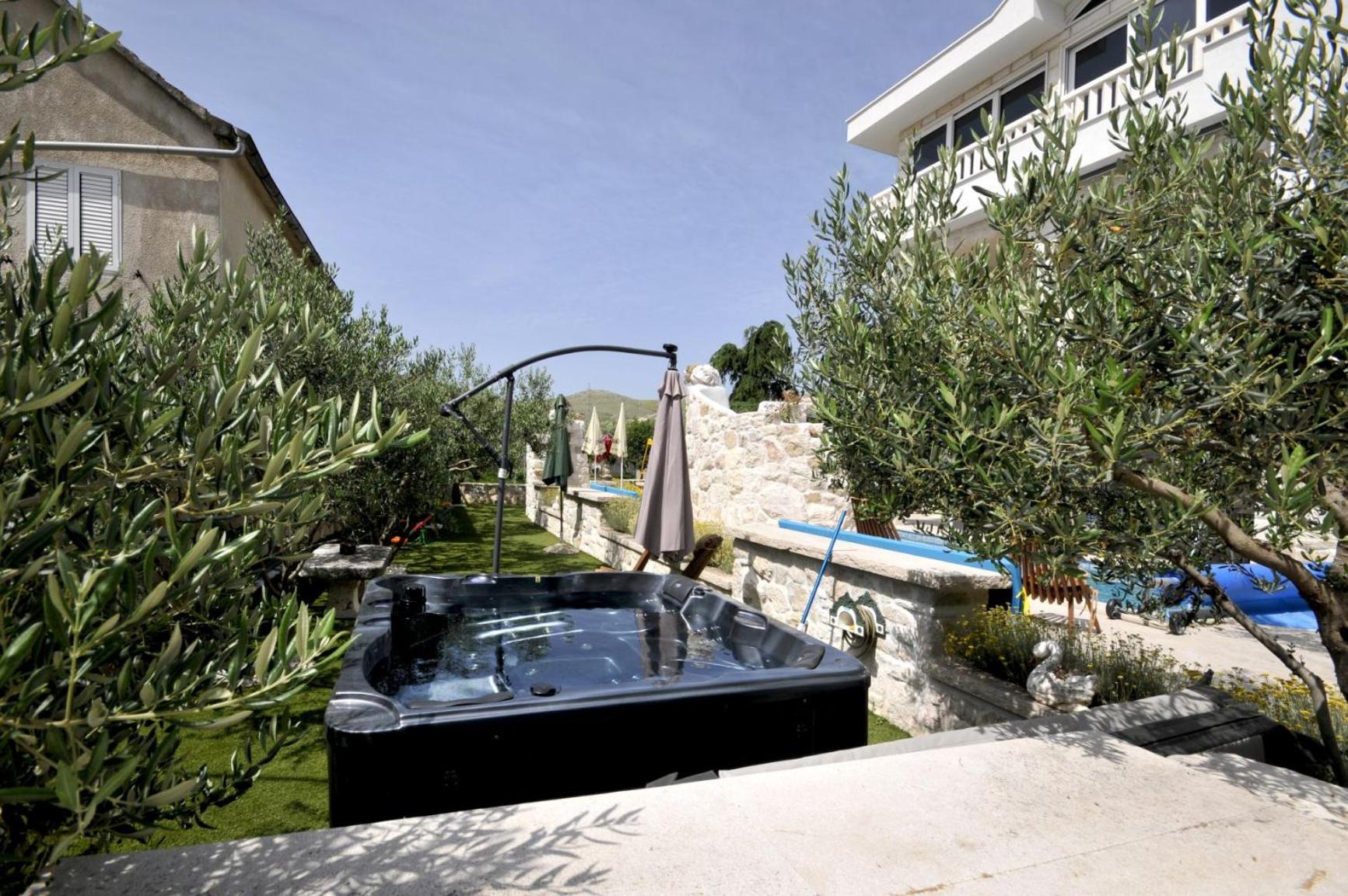 STAGNUM BABA - Impressive Luxury Villa with heated pool, hot tub, playroom and upscale house design view 5