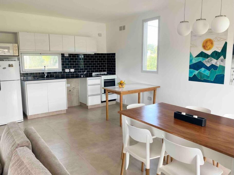 Casa con pileta y parrilla en barrio privado, 2 dormitorios