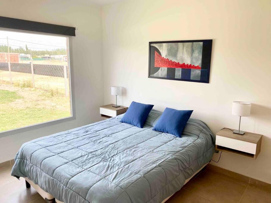 Casa con pileta y parrilla en barrio privado, 2 dormitorios