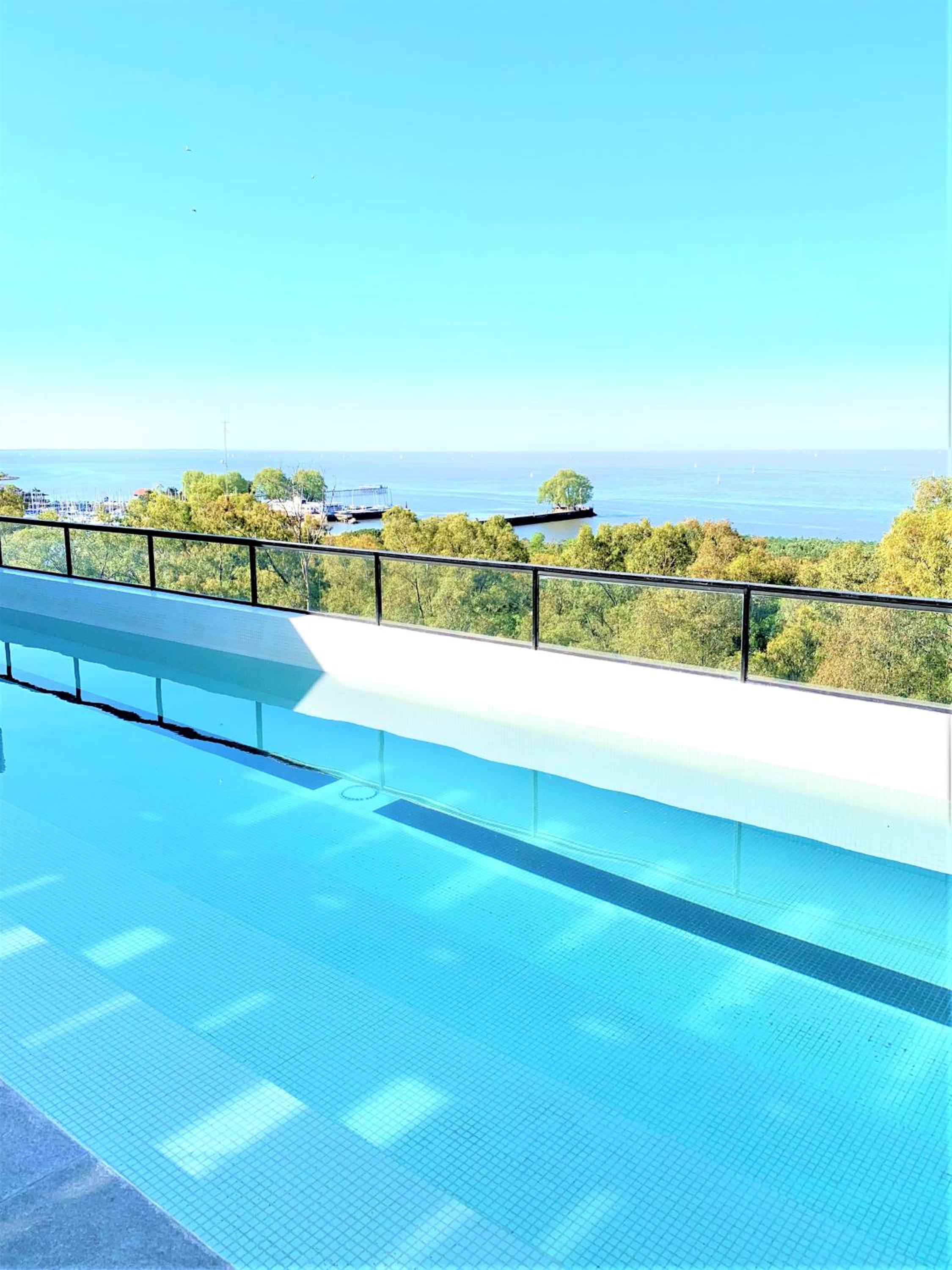 Stylish Apartment by River with Pool & Grill