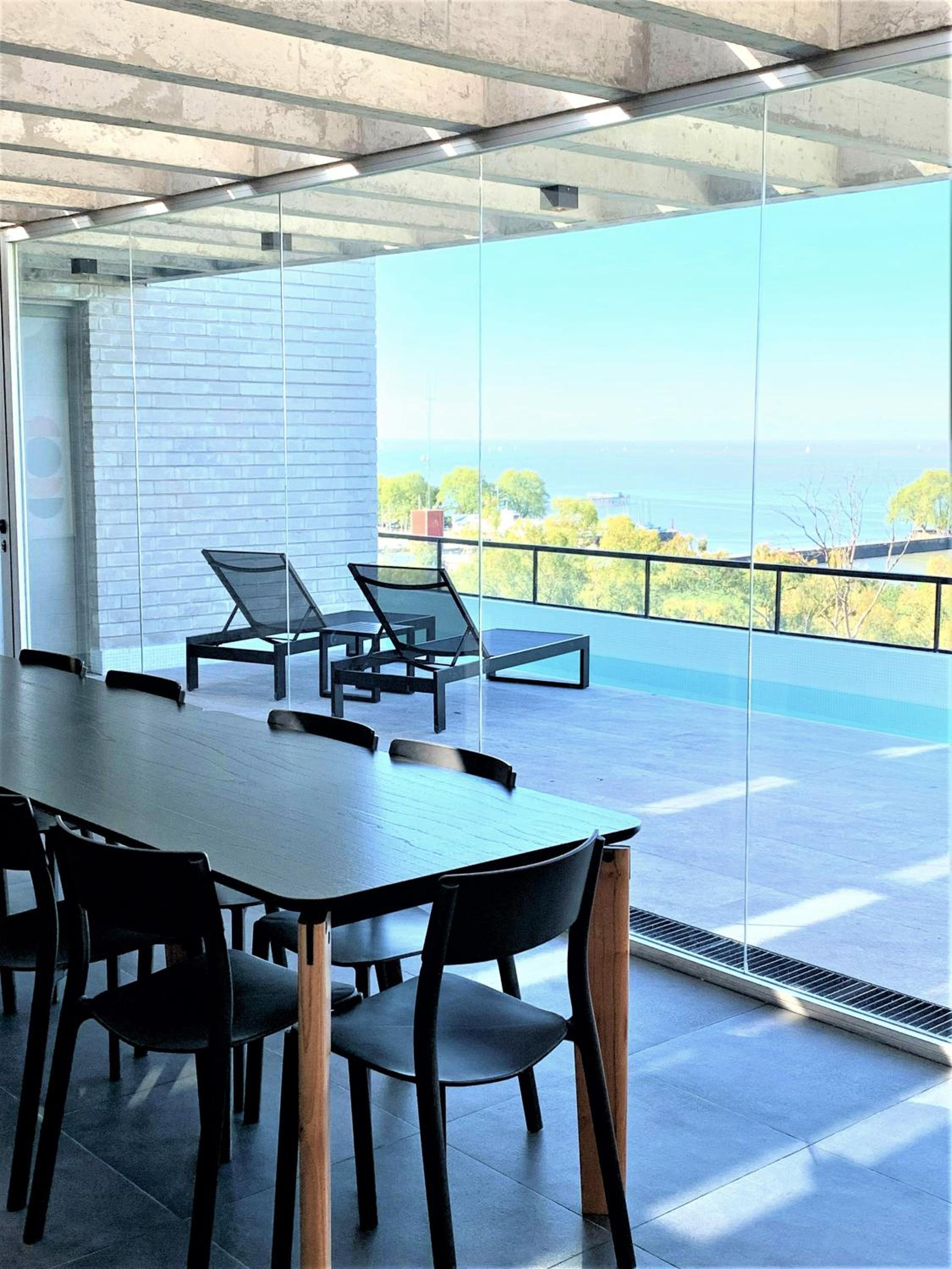 Stylish Apartment by River with Pool & Grill