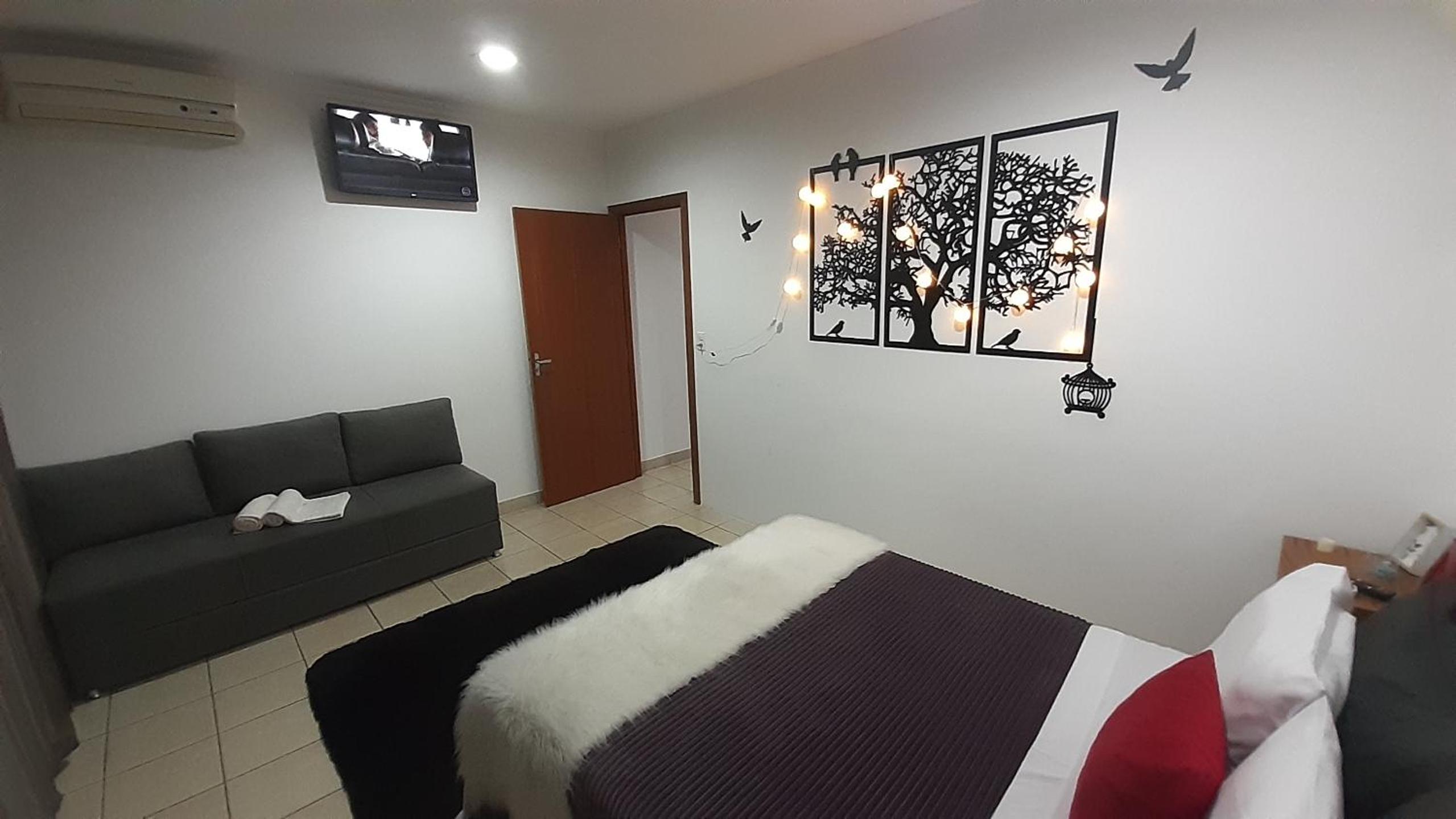 Suite climatizada, ao lado da praca principal