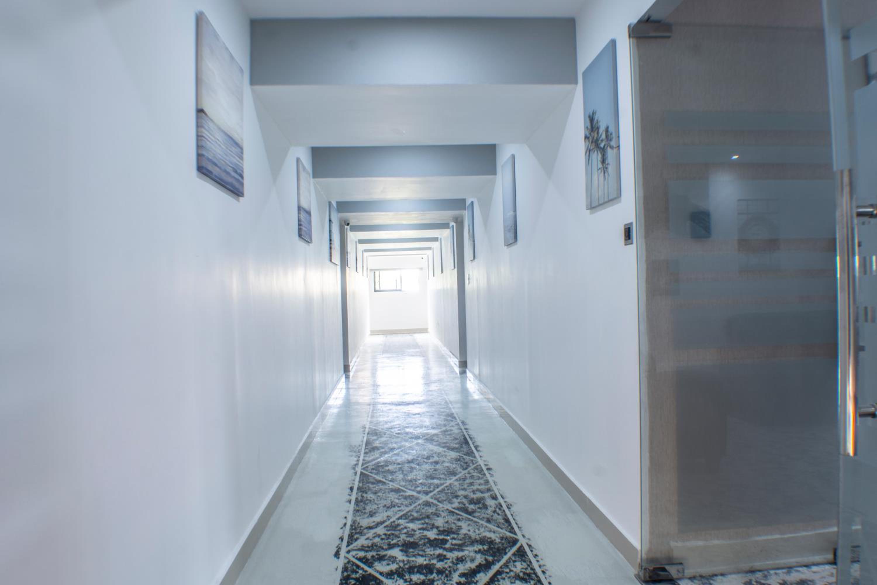 Malecon Rooms y Hotel