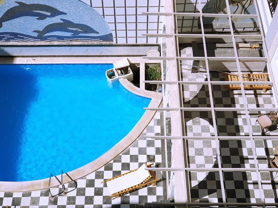 Studio pool view next to the Marina,Sheraton Plaza 320 view 5