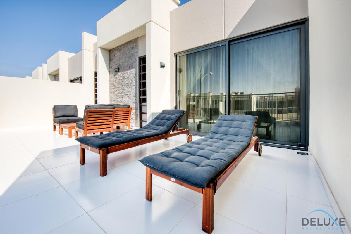Captivating 3BR Townhouse at DAMAC Hills 2 Dubailand By Deluxe Holiday Homes