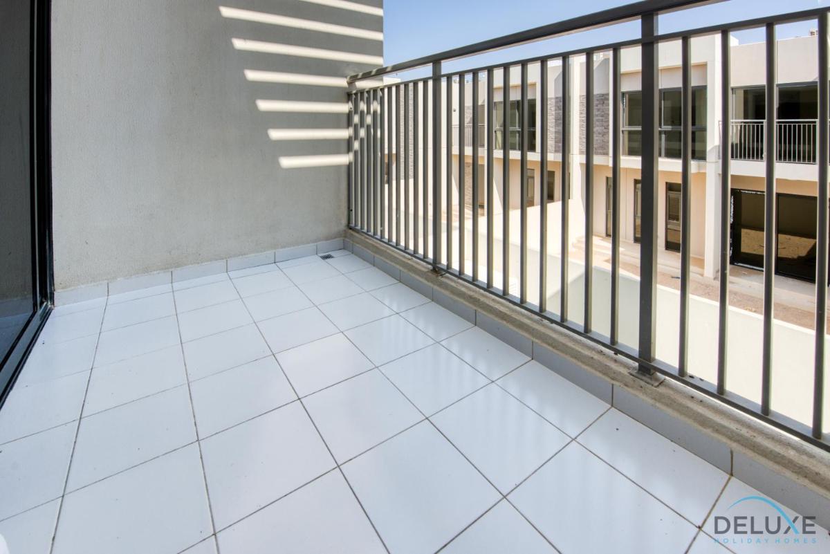Captivating 3BR Townhouse at DAMAC Hills 2 Dubailand By Deluxe Holiday Homes
