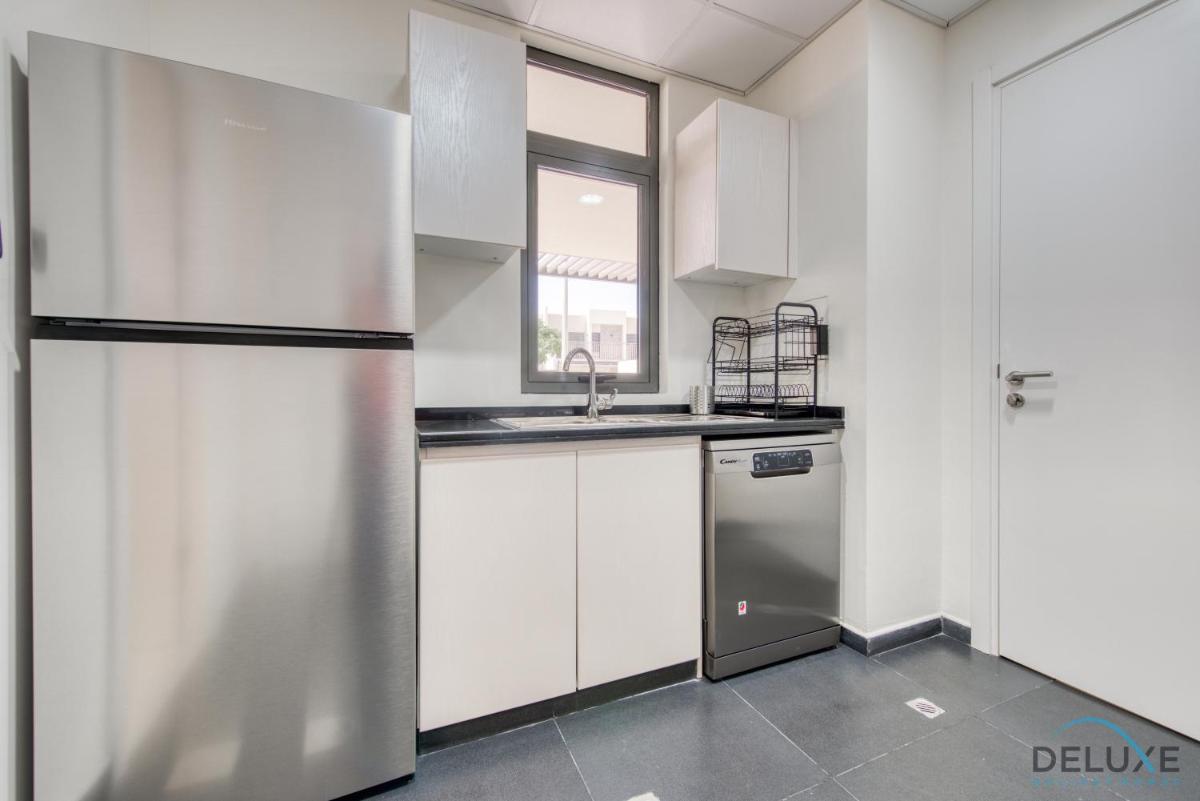 Captivating 3BR Townhouse at DAMAC Hills 2 Dubailand By Deluxe Holiday Homes