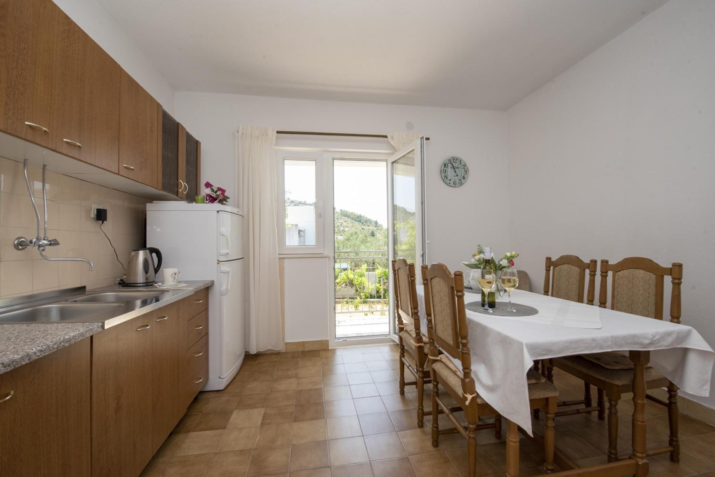 Spacious apartment Zivkovic with balcony, big garden and grill view 2