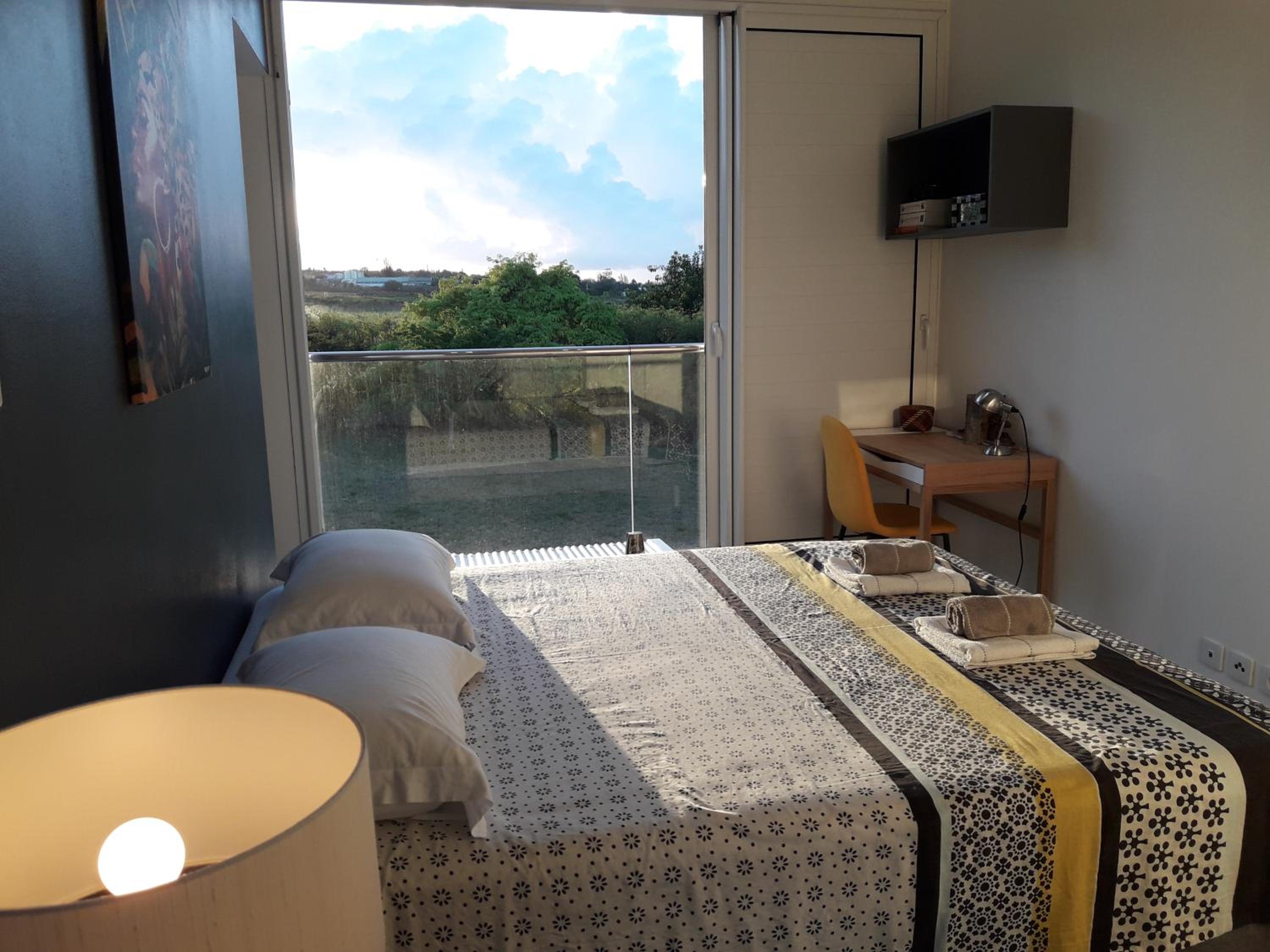Maison TONGA piscine chambre de luxe