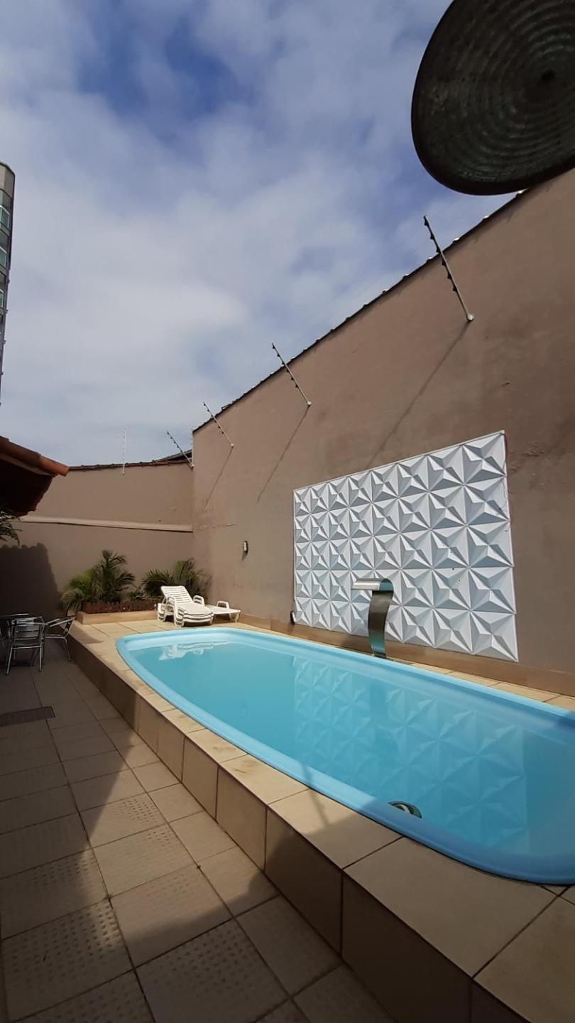 Casa na enseada 3 súite 50m praia