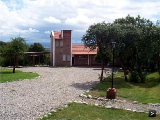 Hotel Cabañas del bosque merlo - Image 1