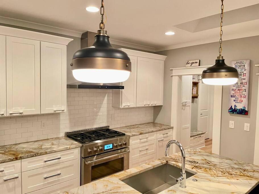 Modern 4BR 2BA Home w/ Porch Swing - Walk&Bike ATL view 2