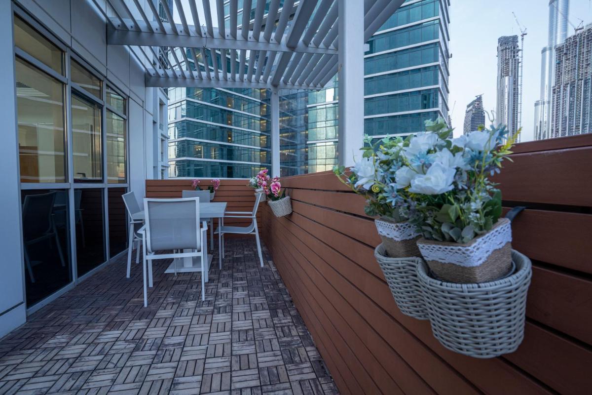 3 Bedroom Condo w terrace facing Burj Khalifa.