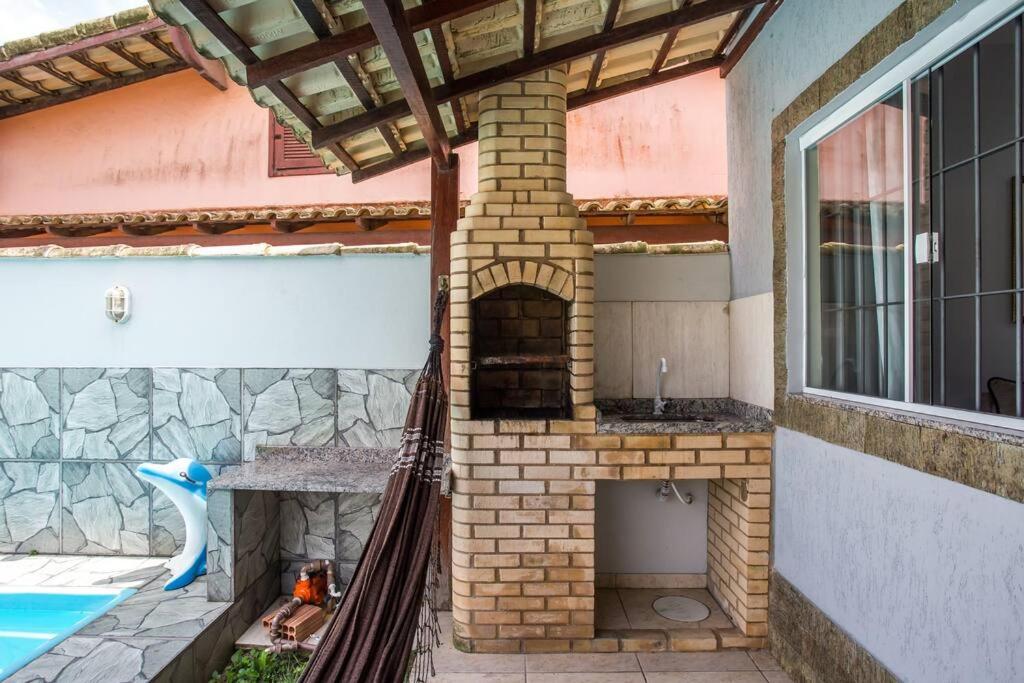 Casa com piscina, wifi e churrasqueira em unamar.