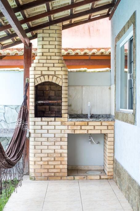 Casa com piscina, wifi e churrasqueira em unamar.