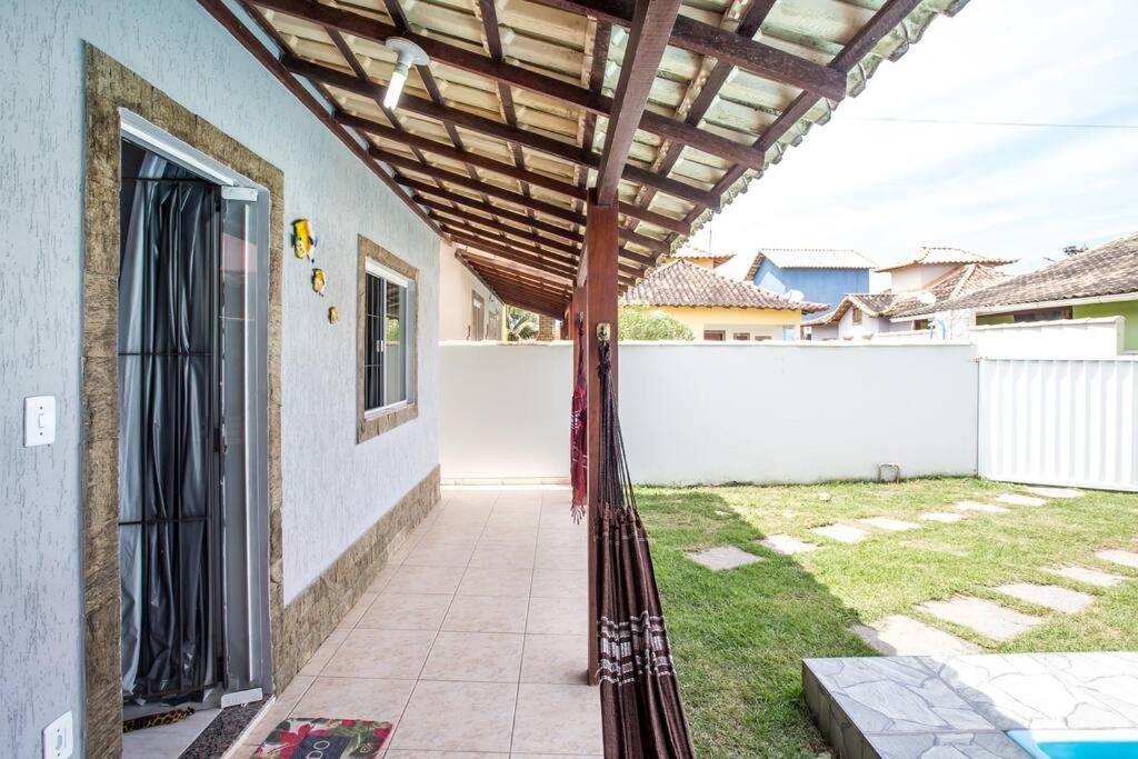 Casa com piscina, wifi e churrasqueira em unamar.