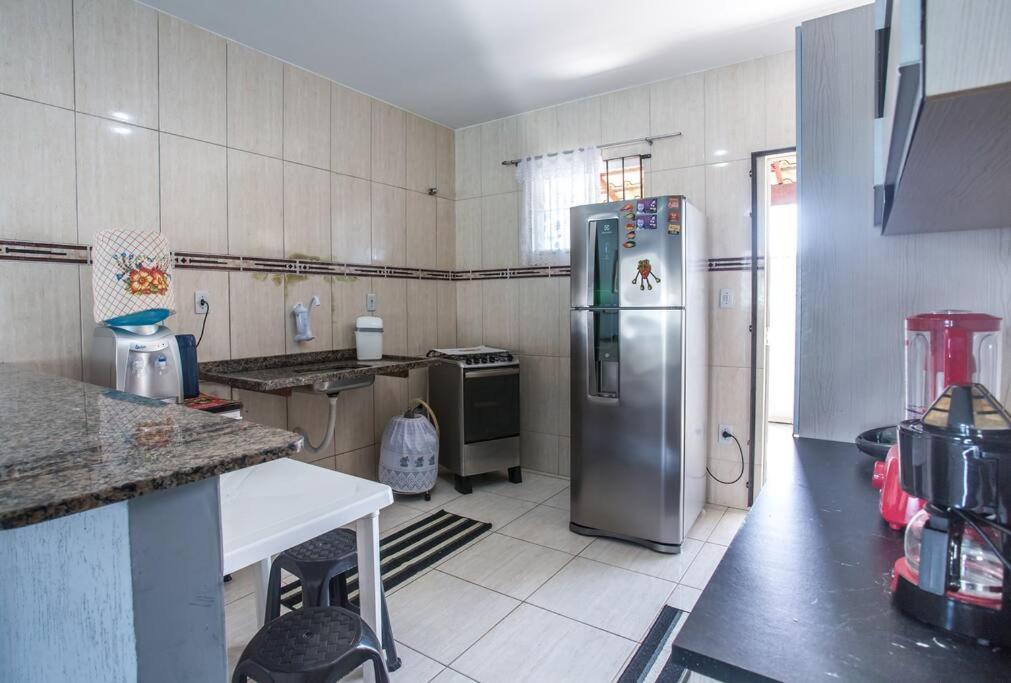 Casa com piscina, wifi e churrasqueira em unamar.