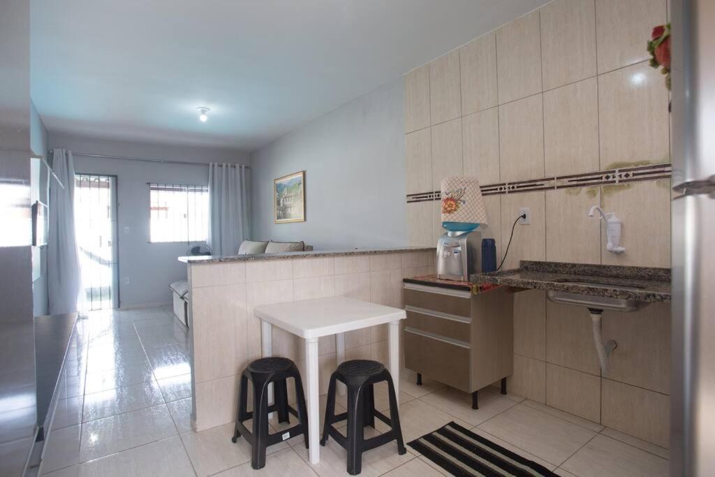 Casa com piscina, wifi e churrasqueira em unamar.