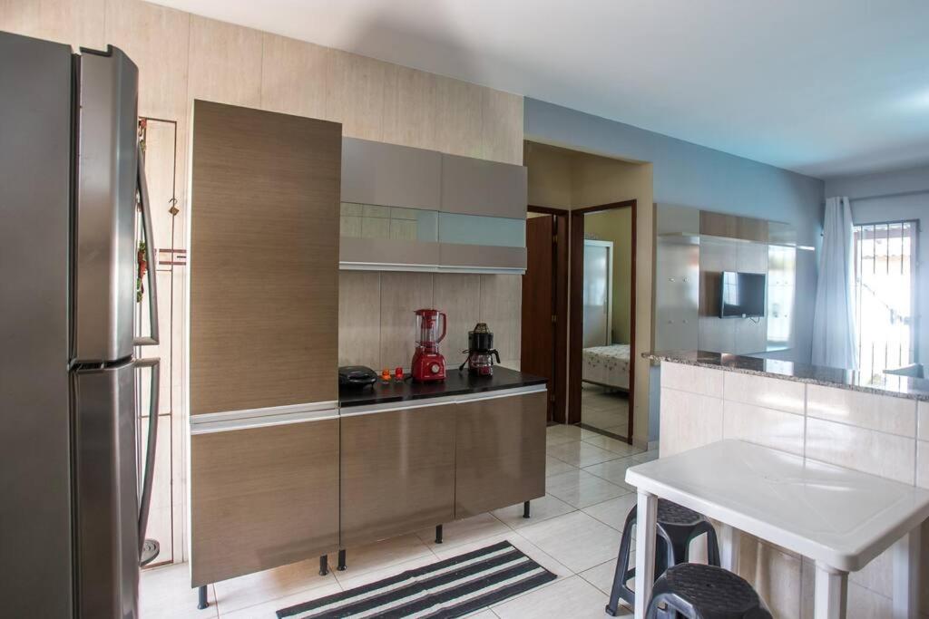 Casa com piscina, wifi e churrasqueira em unamar.