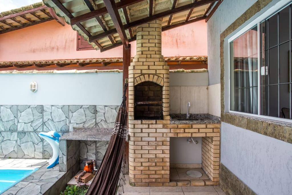 Casa com piscina, wifi e churrasqueira em unamar.
