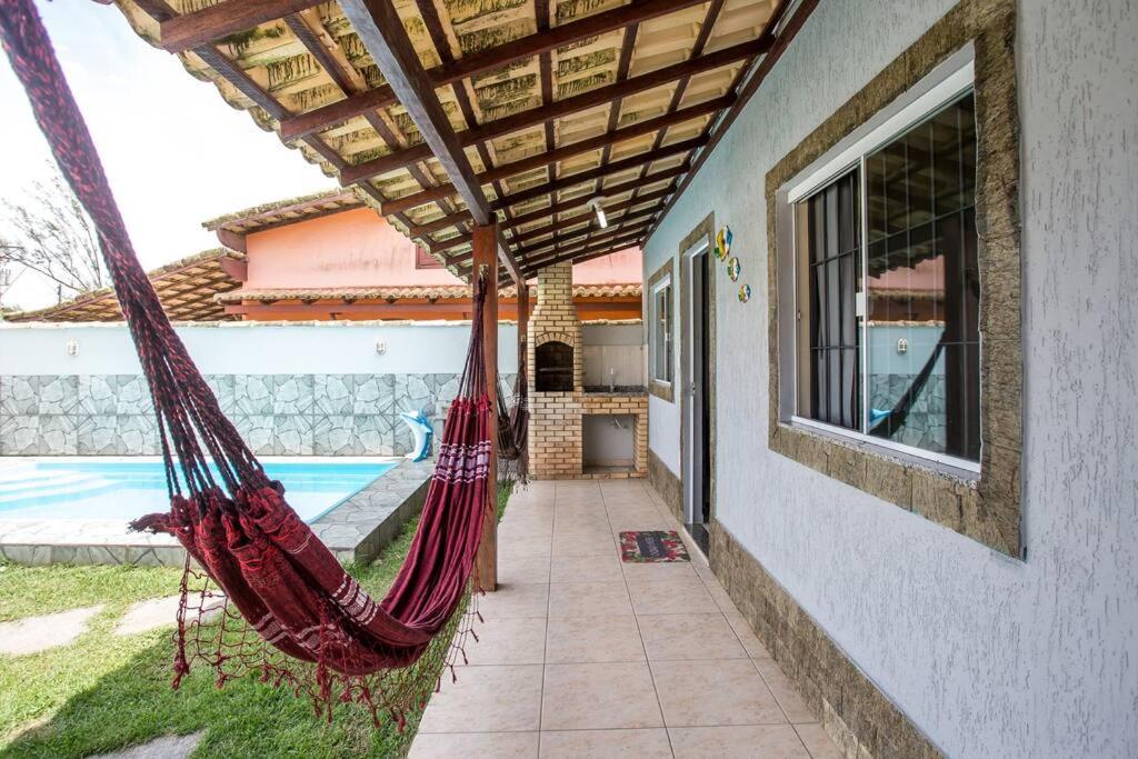 Casa com piscina, wifi e churrasqueira em unamar.