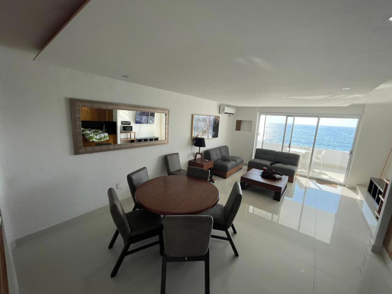 INCREIBLE DEPARTAMENTO A PIE DE PLAYA EN MANZANILLO, COMPLETAMENTE NUEVO