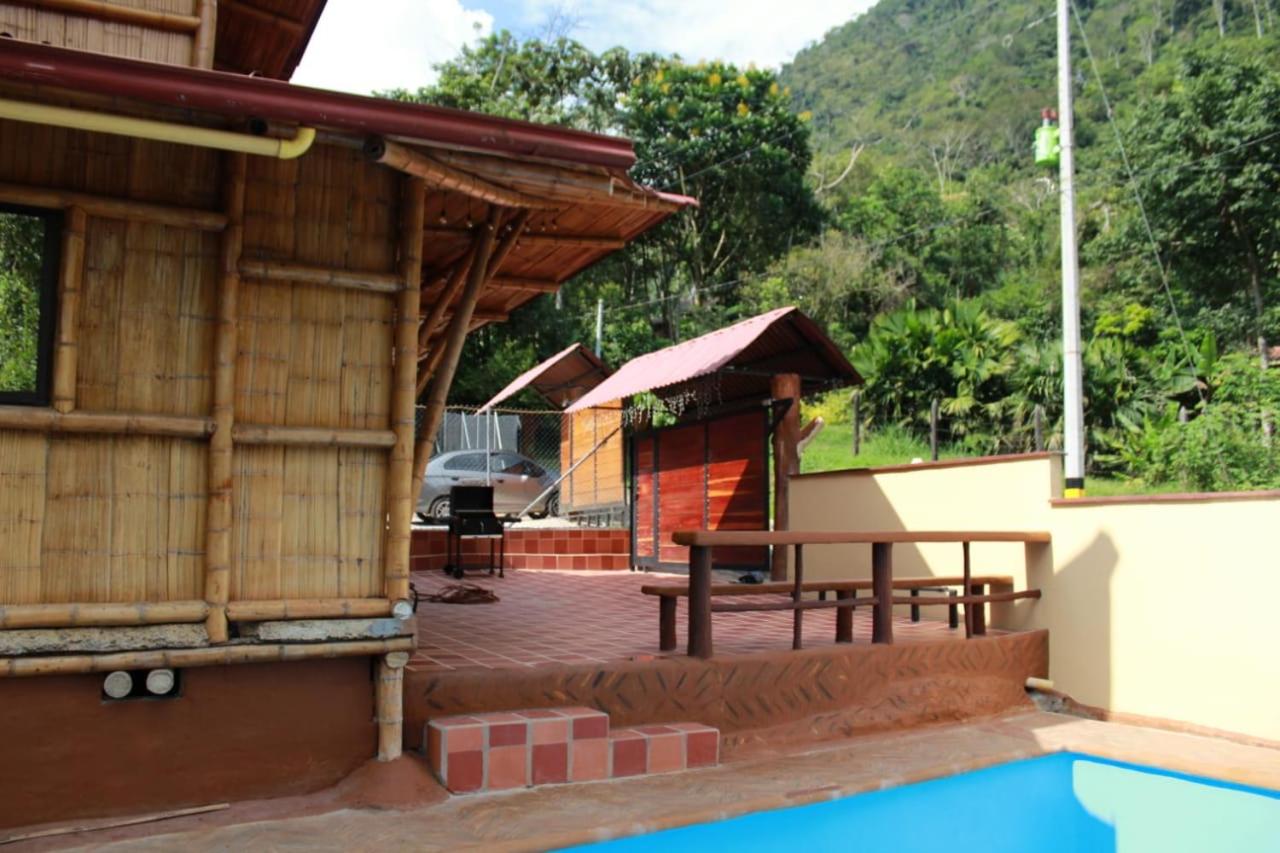 hermosa cabaña villa majo, cuenta con el espectacular rio santo domingo view 4