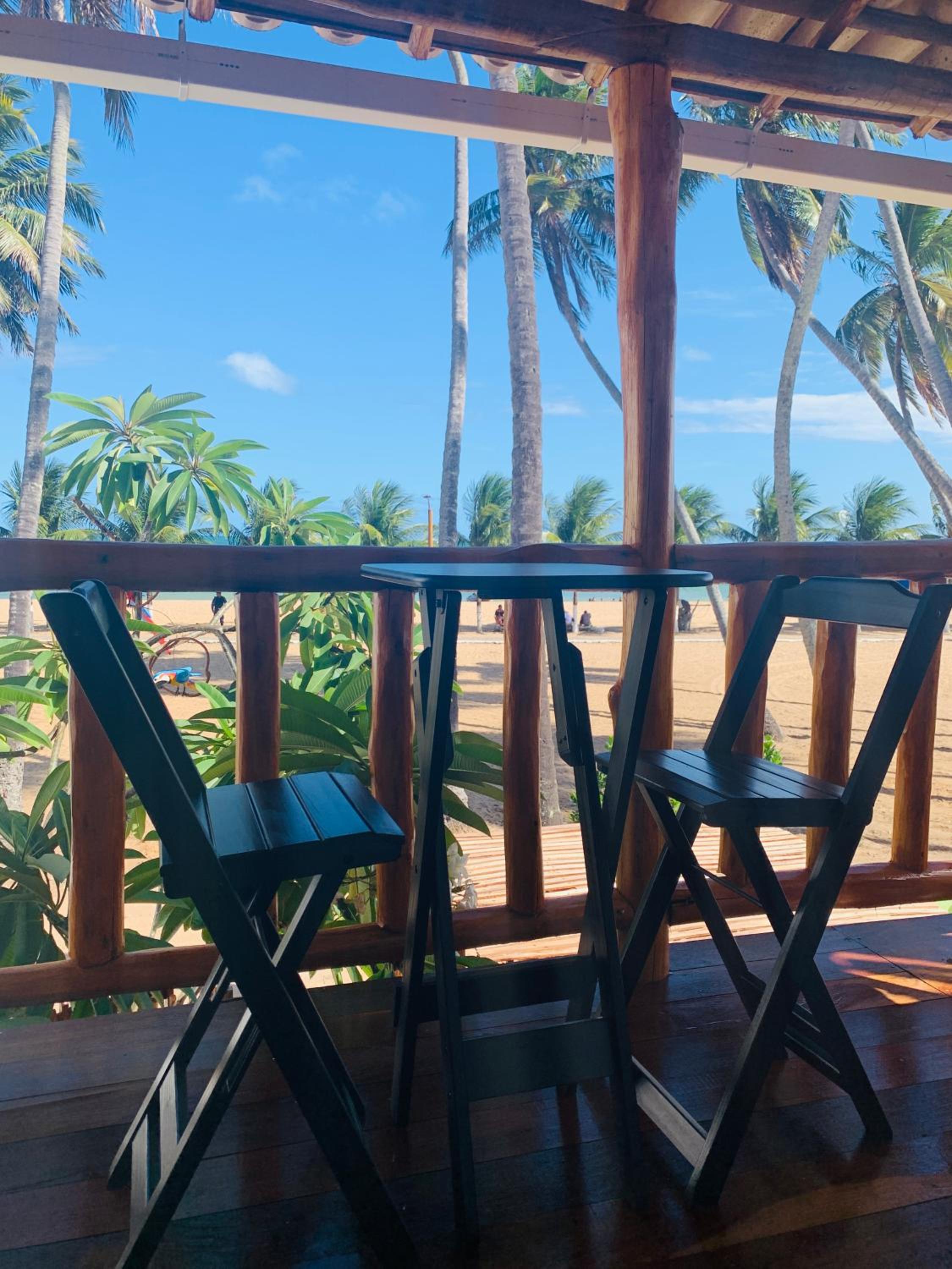 Suíte frente mar e pés na areia