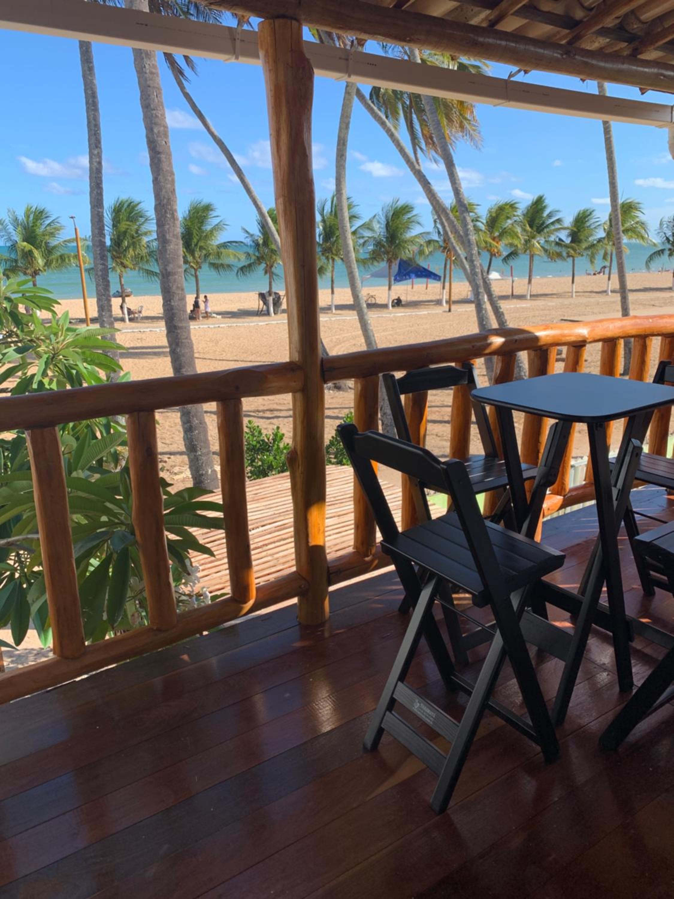 Suíte frente mar e pés na areia