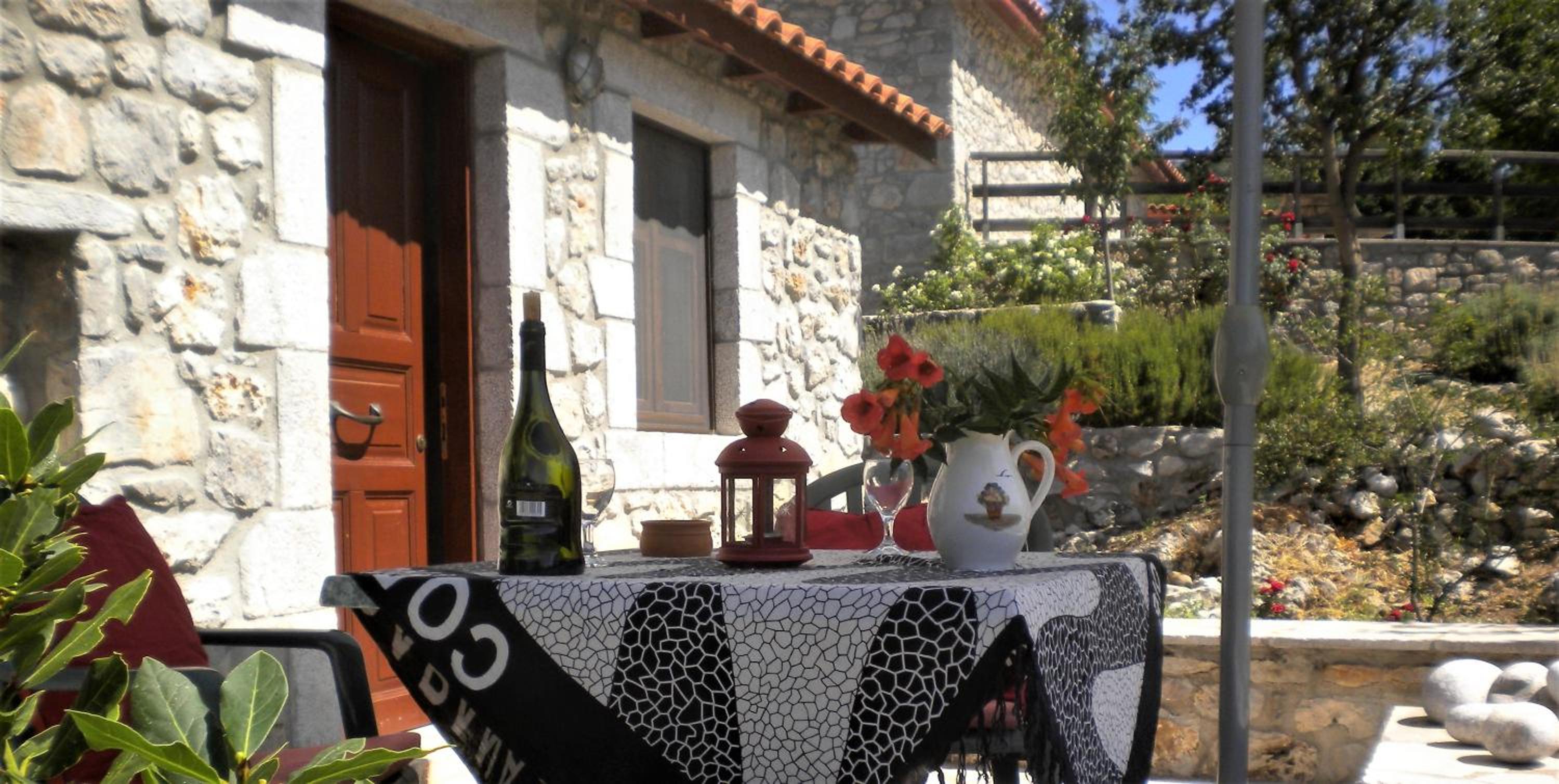 Amygdalia, a Stone House in a quiet landscape view 4